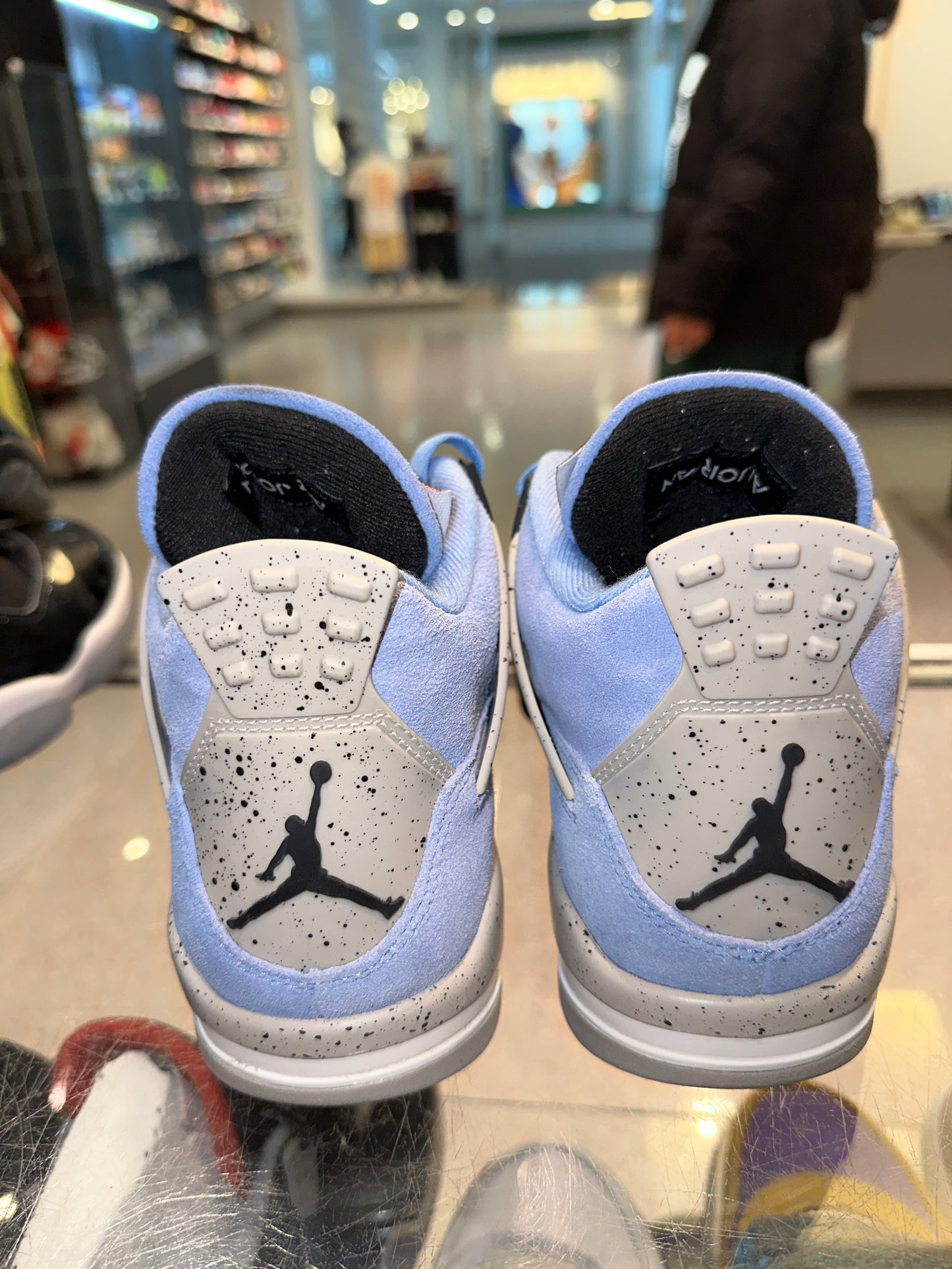 Size 7.5 Air Jordan 4 “University Blue”  (Mall)