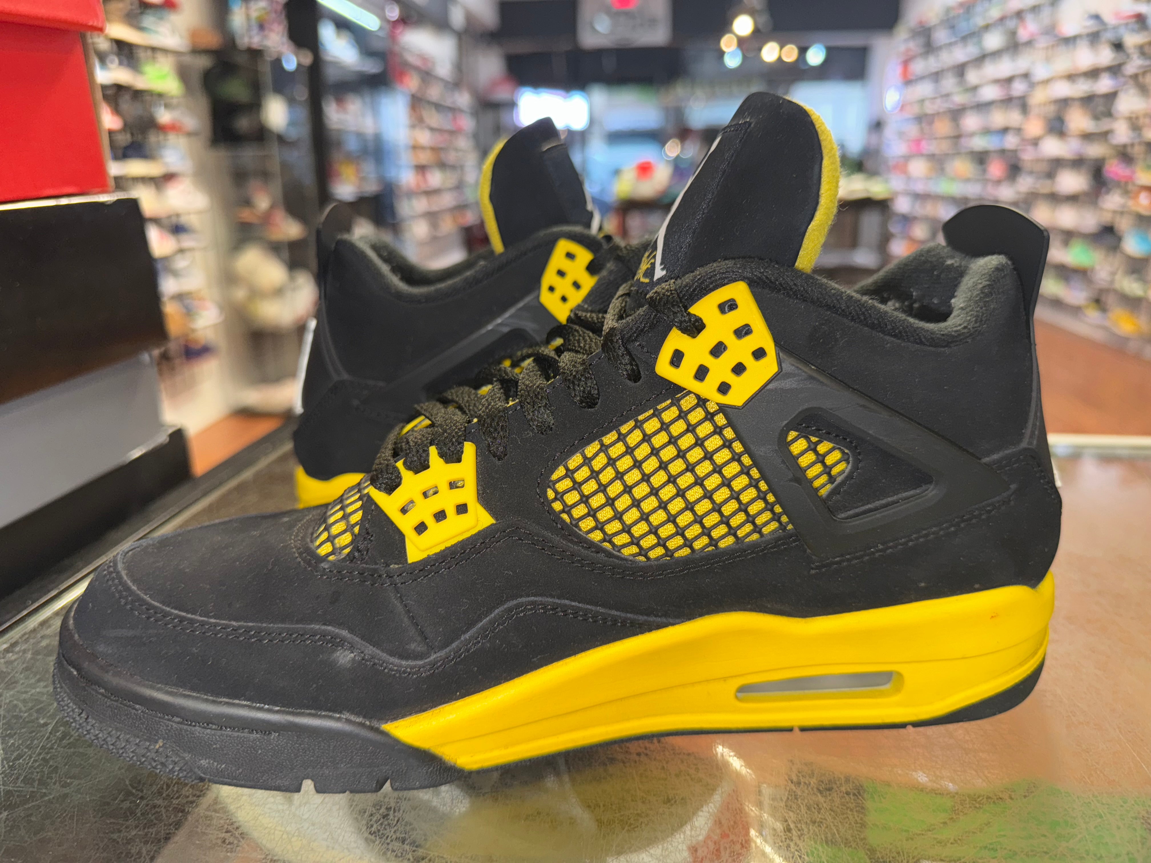 Size 9.5 Air Jordan 4 "Thunder"