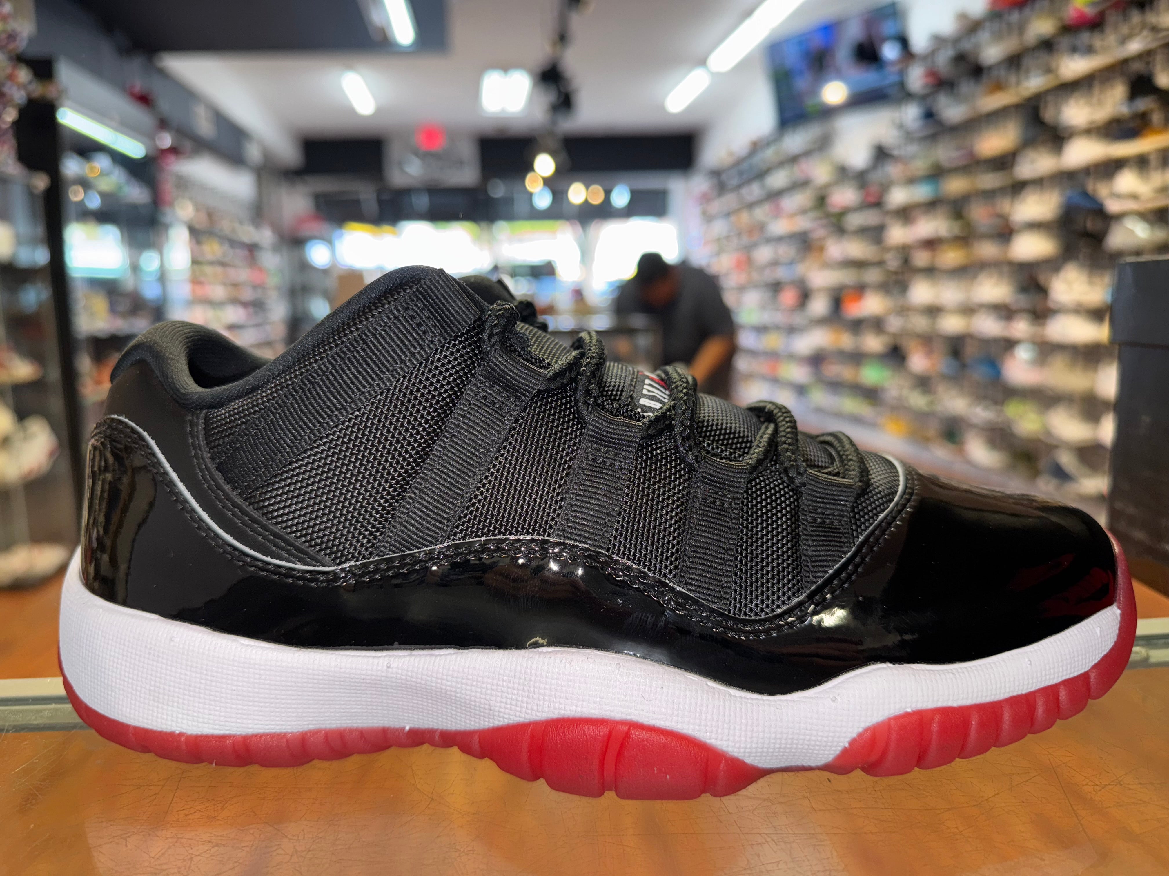 Size 7y Air Jordan 11 Low "Bred" (2025)