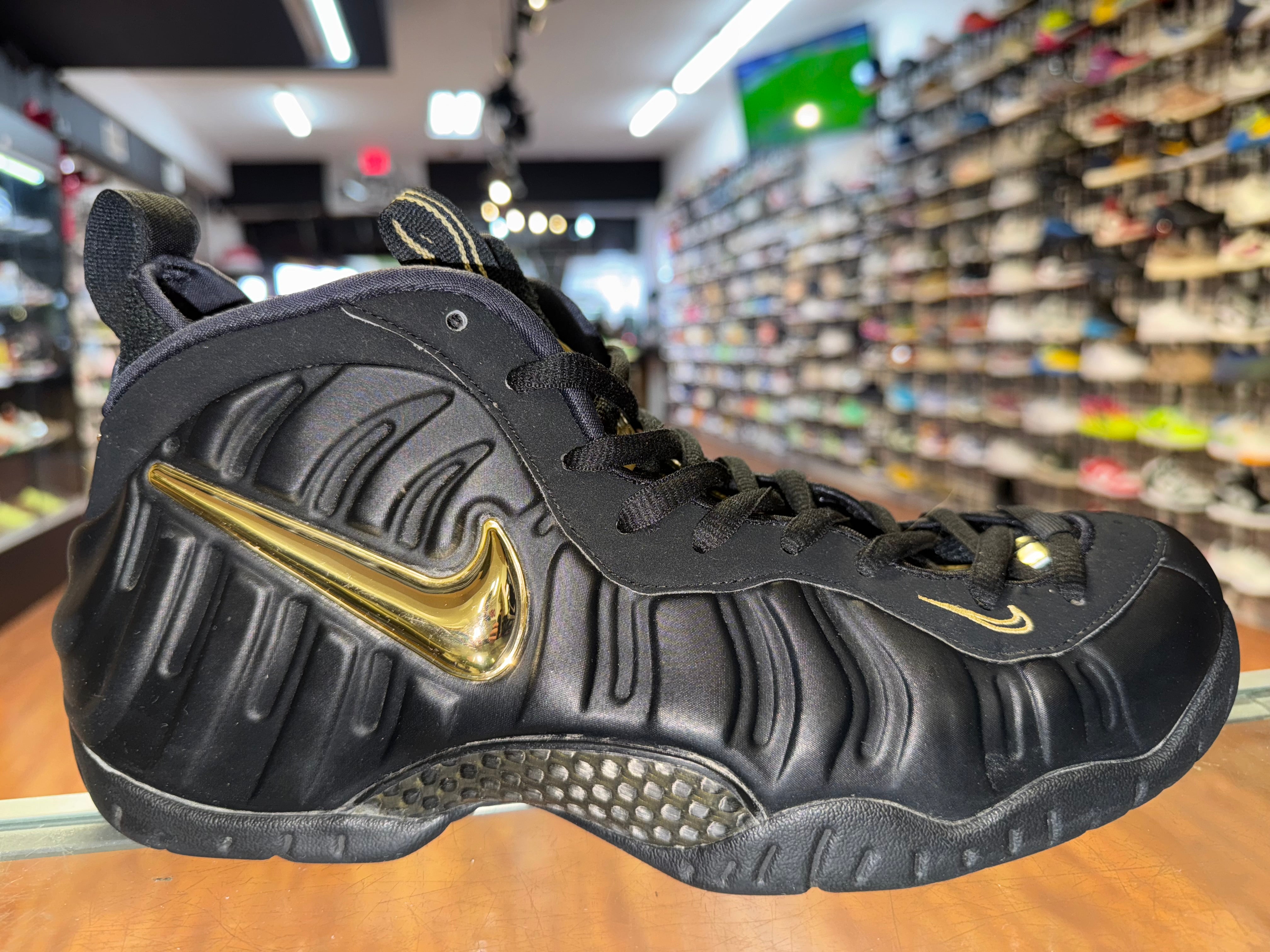 Size 9.5 Foamposite Pro "Black Metallic Gold"