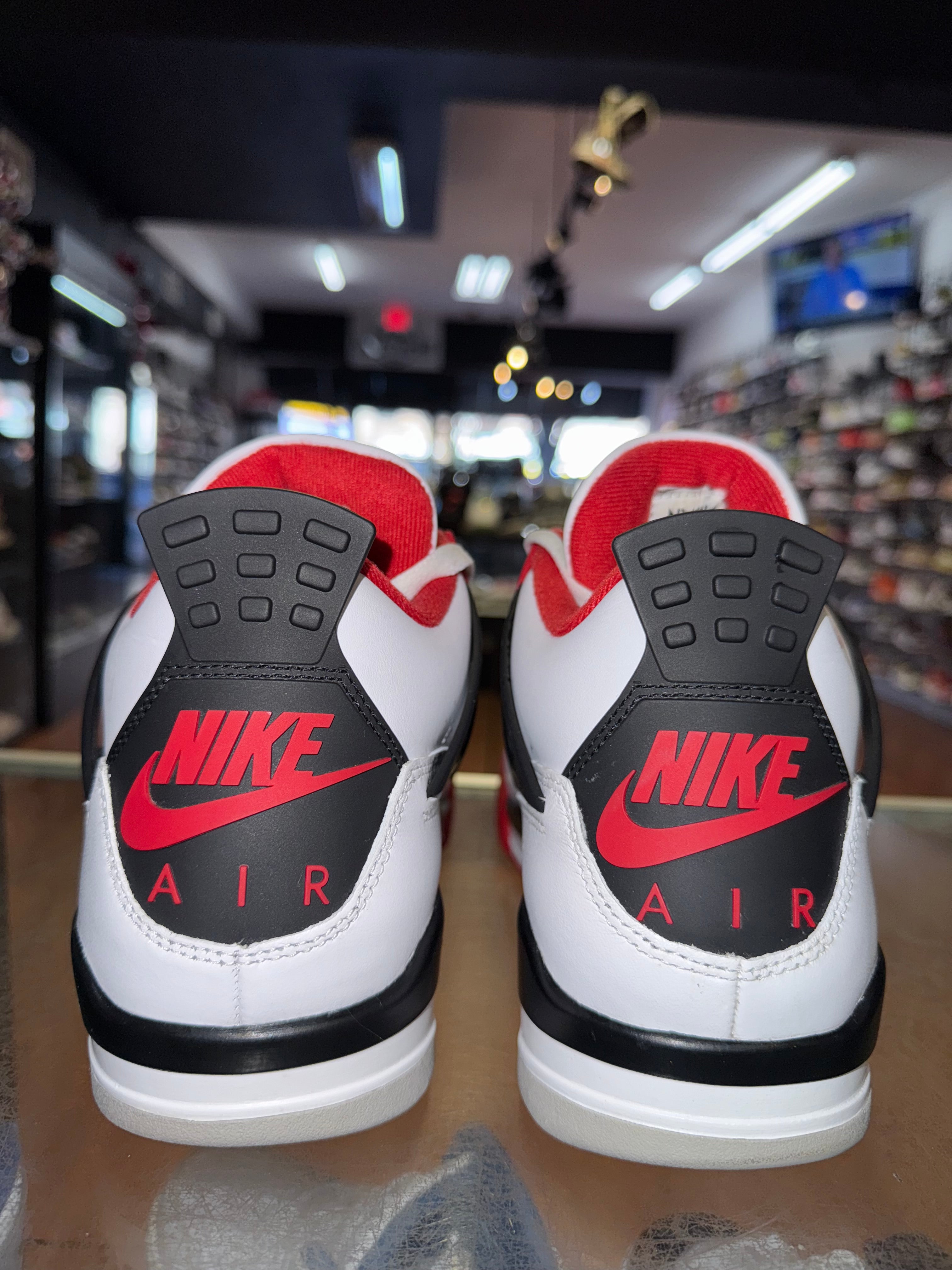 Size 10.5 Air Jordan 4 "Fire Red"