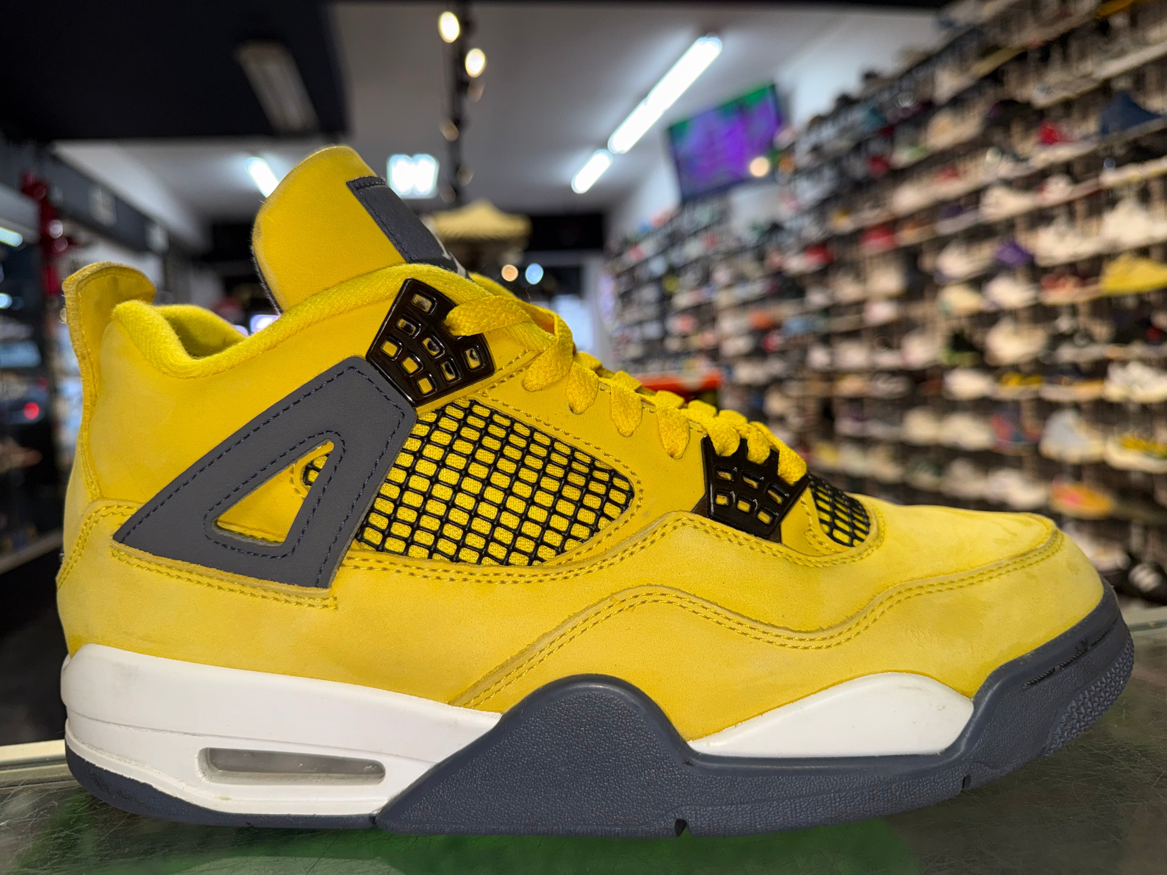 Size 9.5 Air Jordan 4 “Lightning”