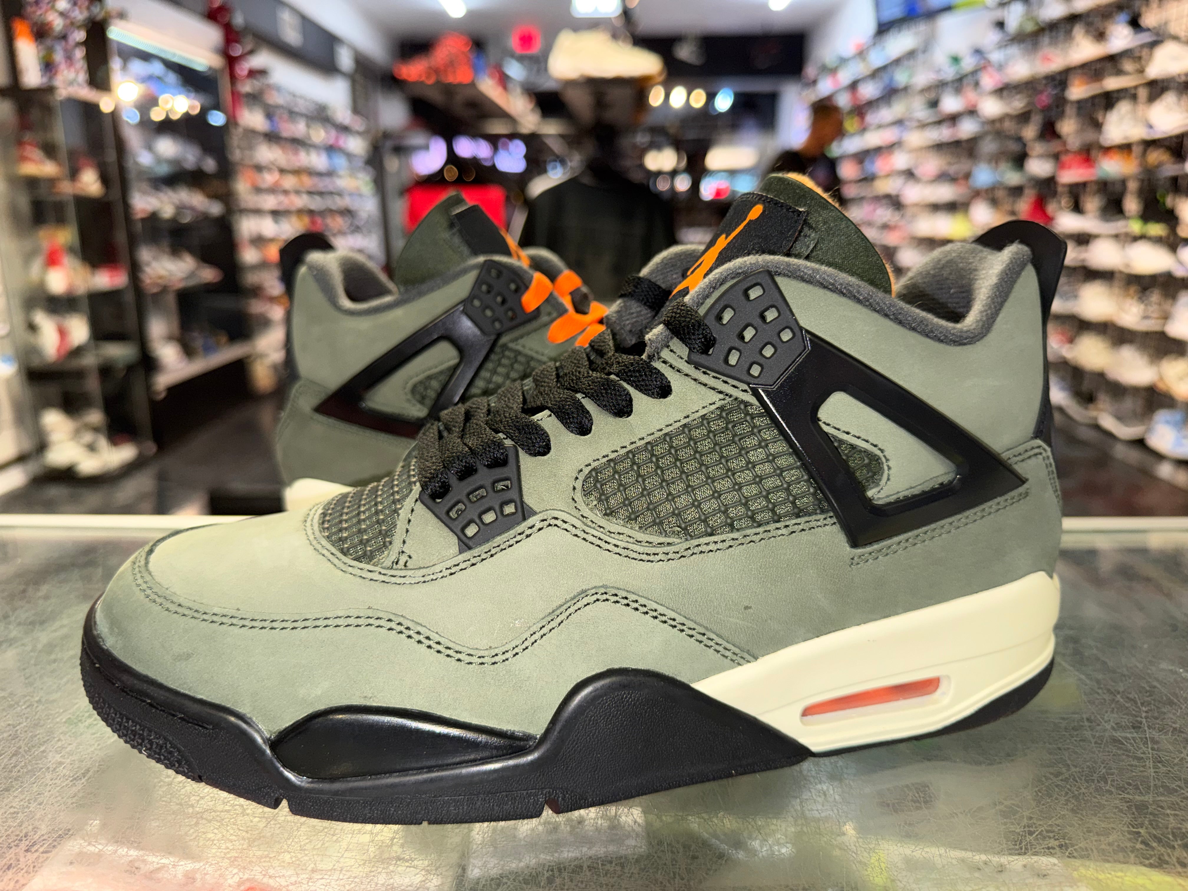 Size 9.5 Air Jordan 4 "Undefeated"