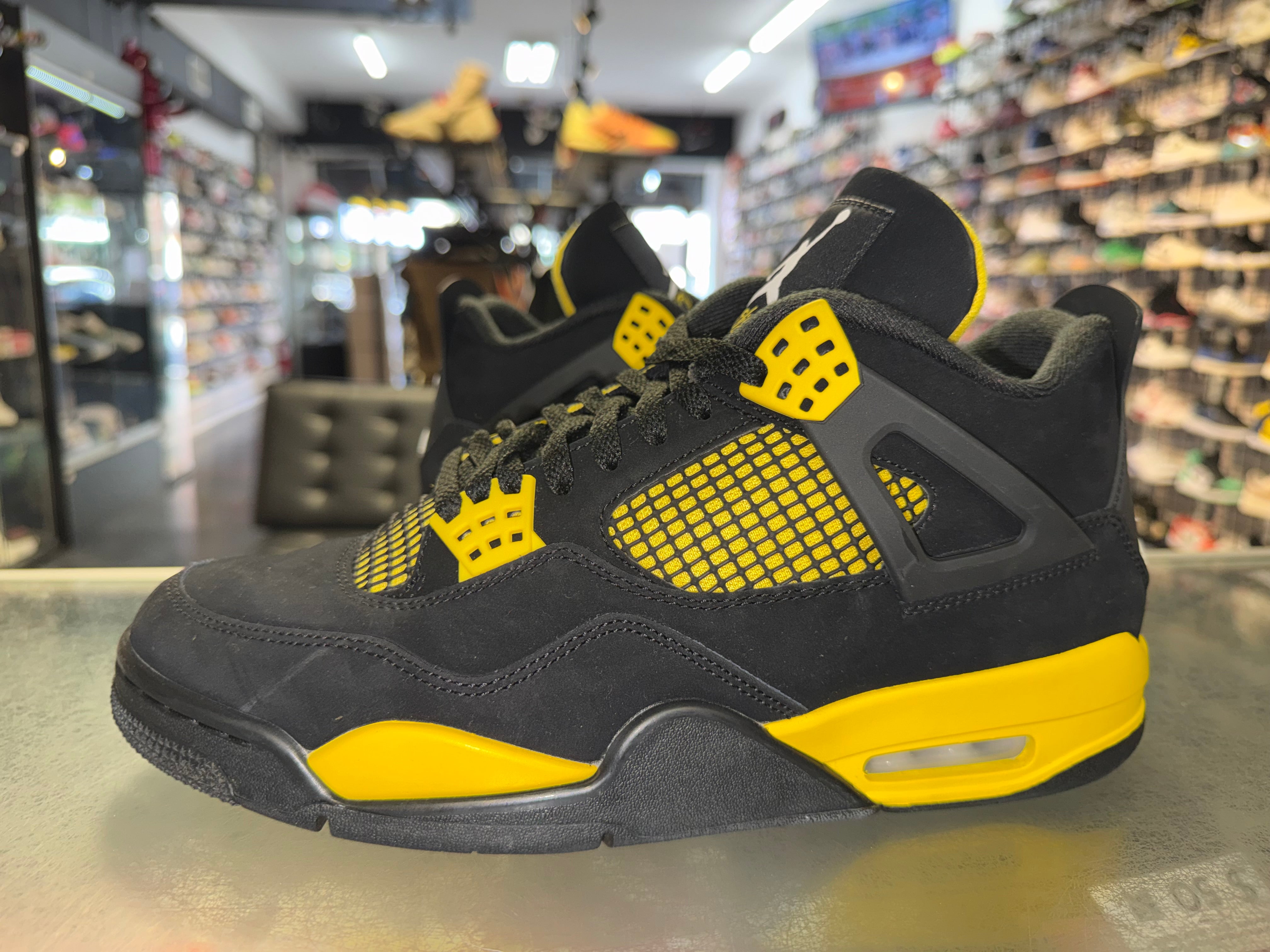 Size 10 Air Jordan 4 "Thunder"