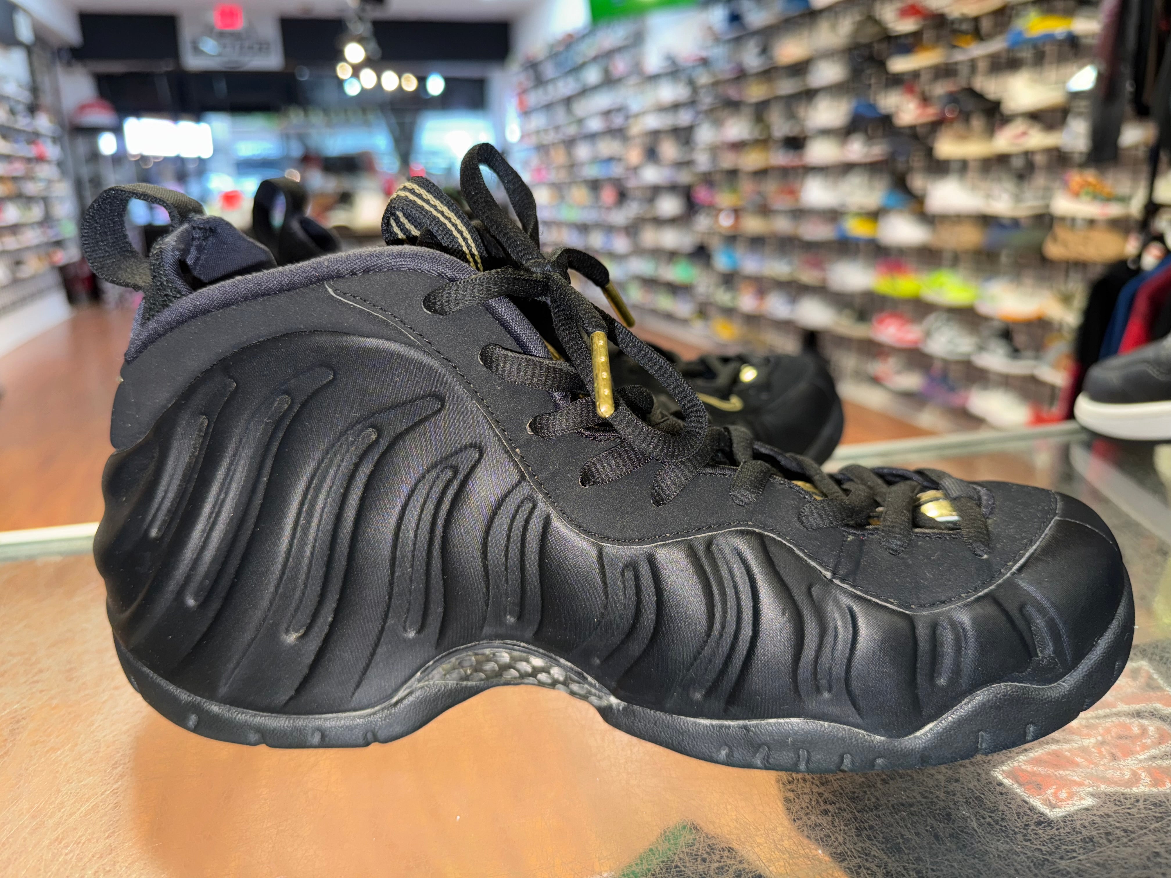Size 9.5 Foamposite Pro "Black Metallic Gold"