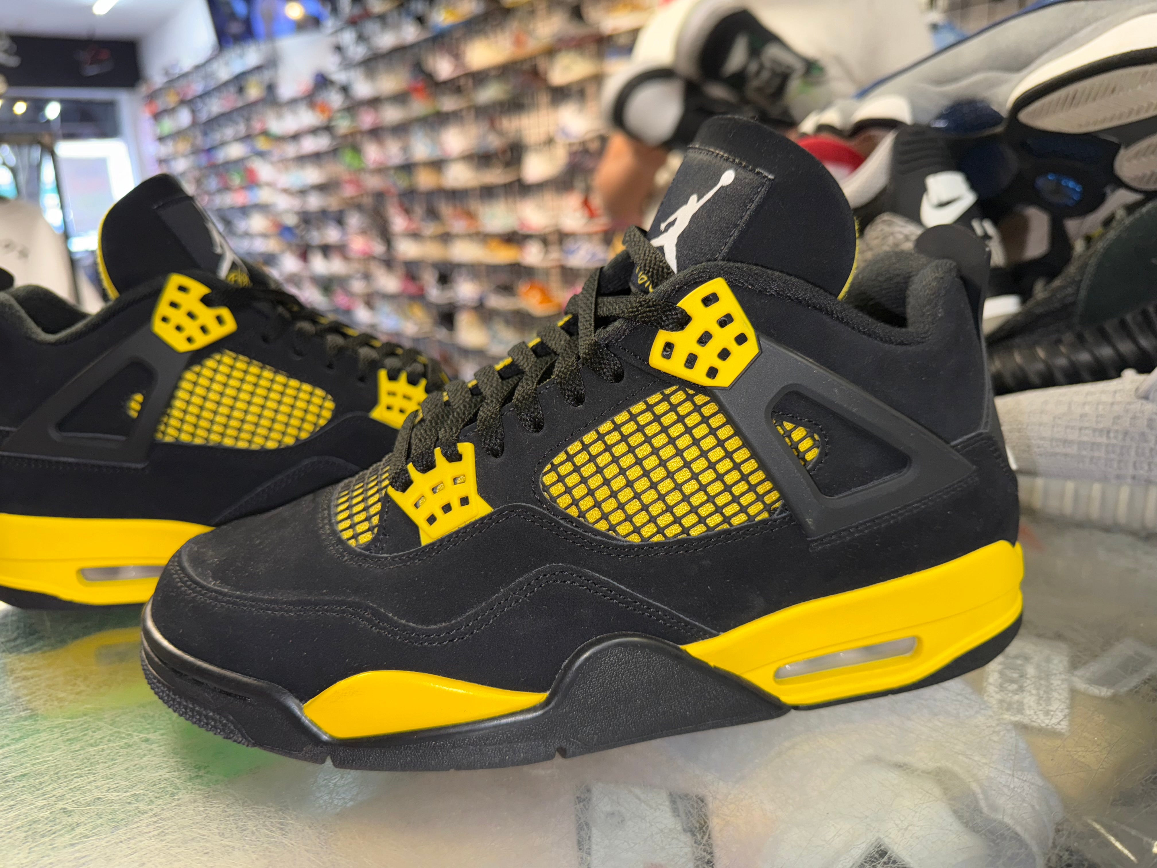 Size 10 Air Jordan 4 "Thunder"