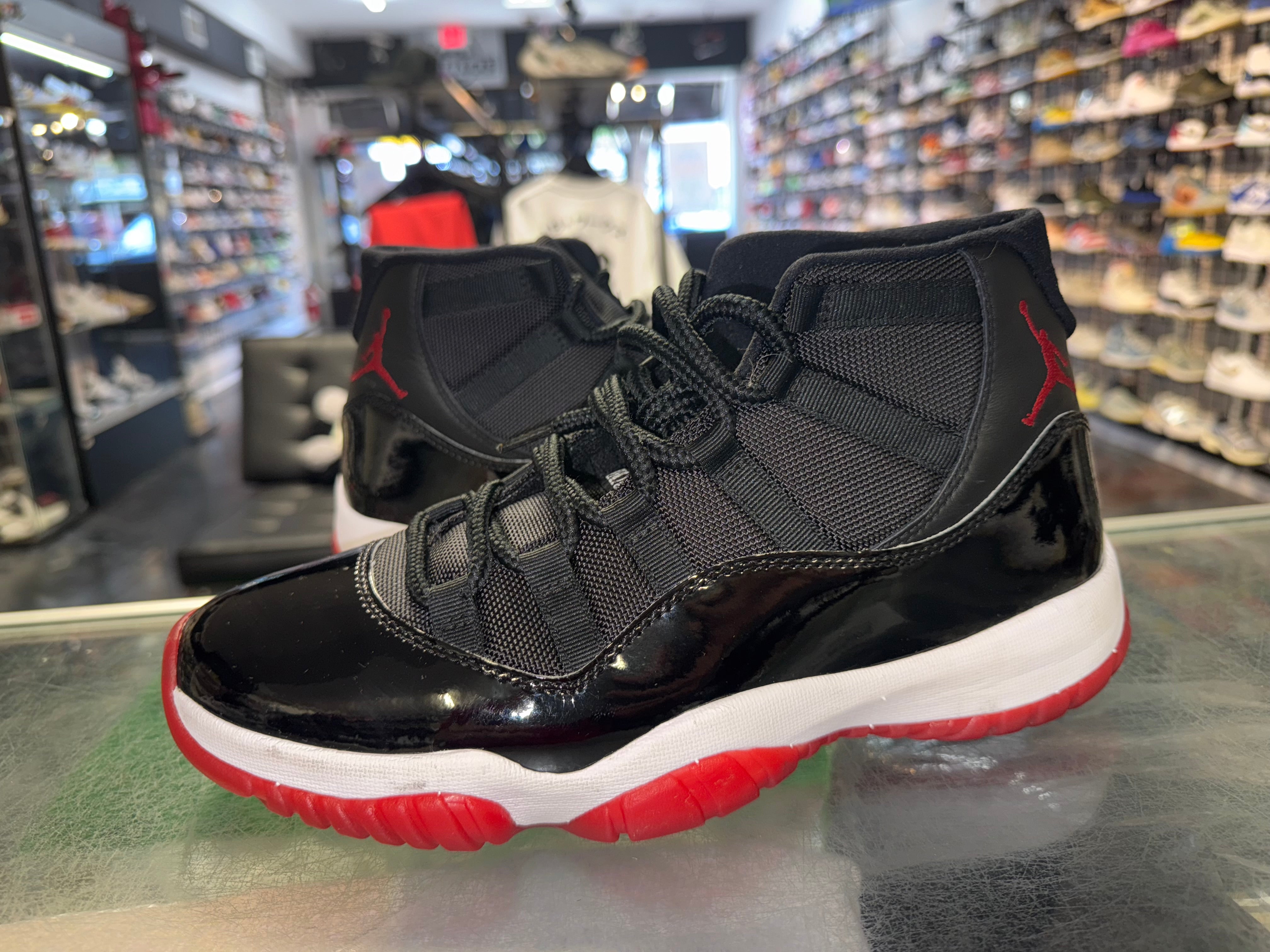 Size 9.5 Air Jordan 11 “Bred”