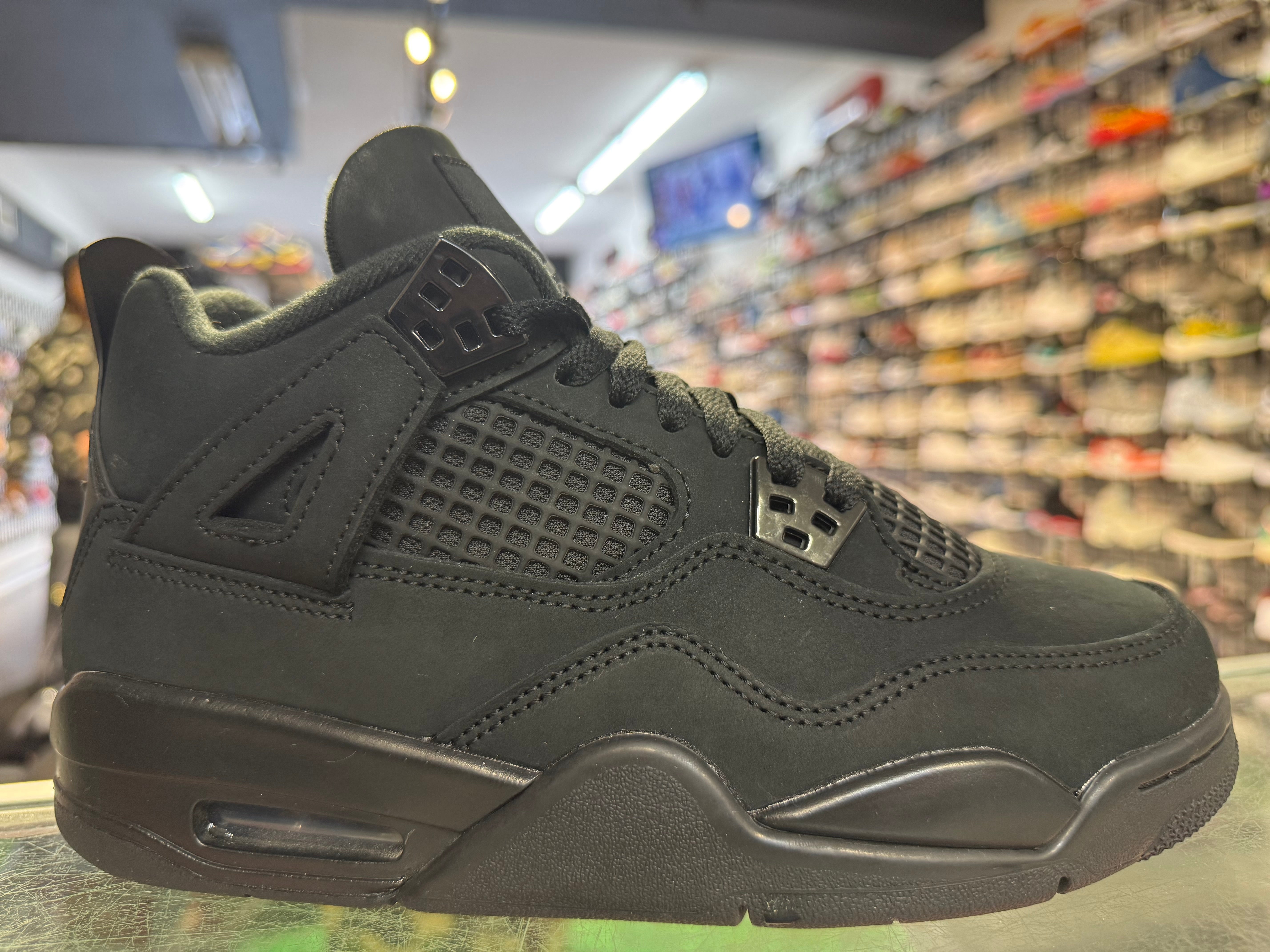 Size 6y Air Jordan 4 "Black Cat"