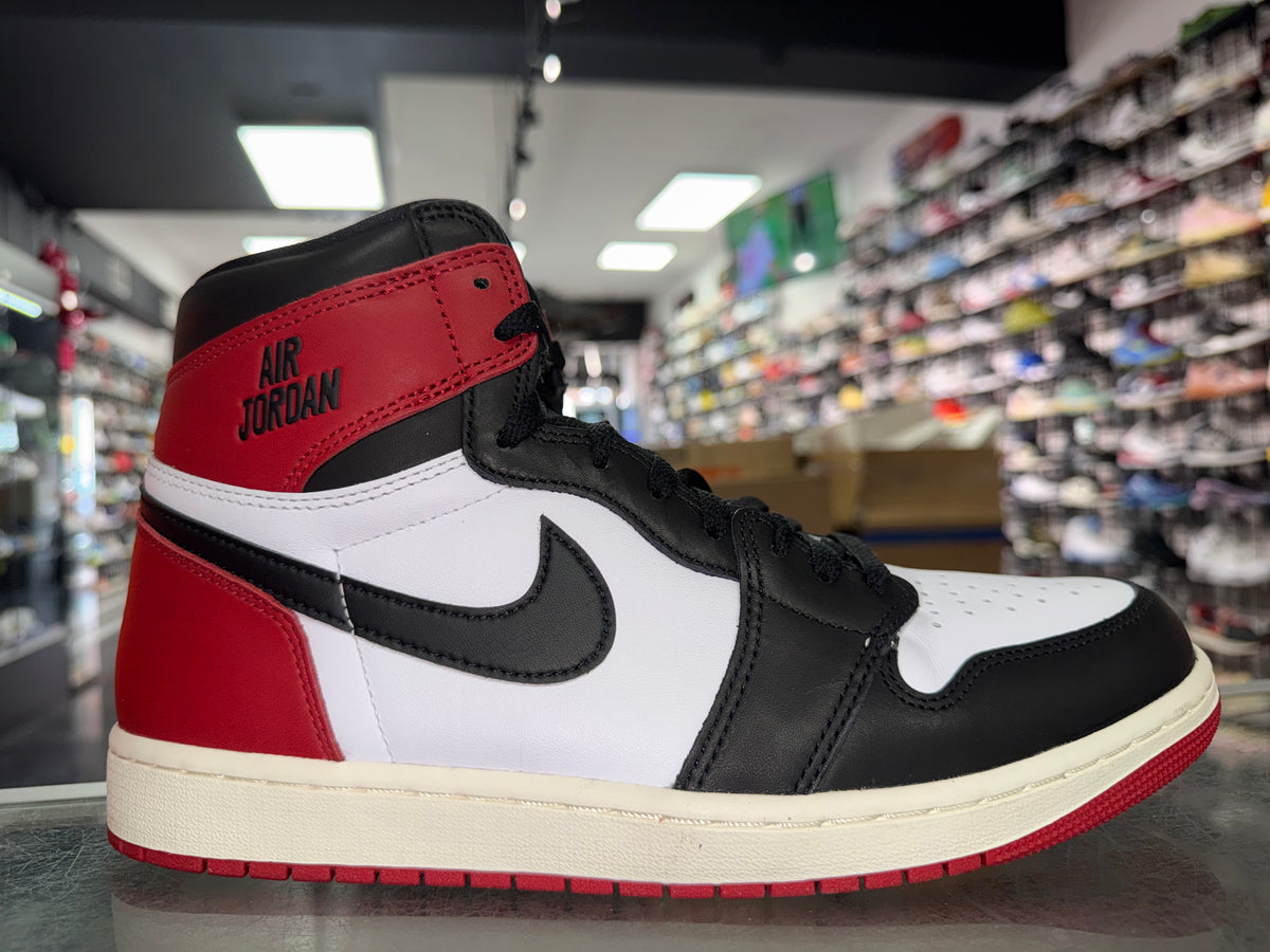 Air Jordan 1 Black Toe Reimagined sneaker, pre-owned, size 10.5