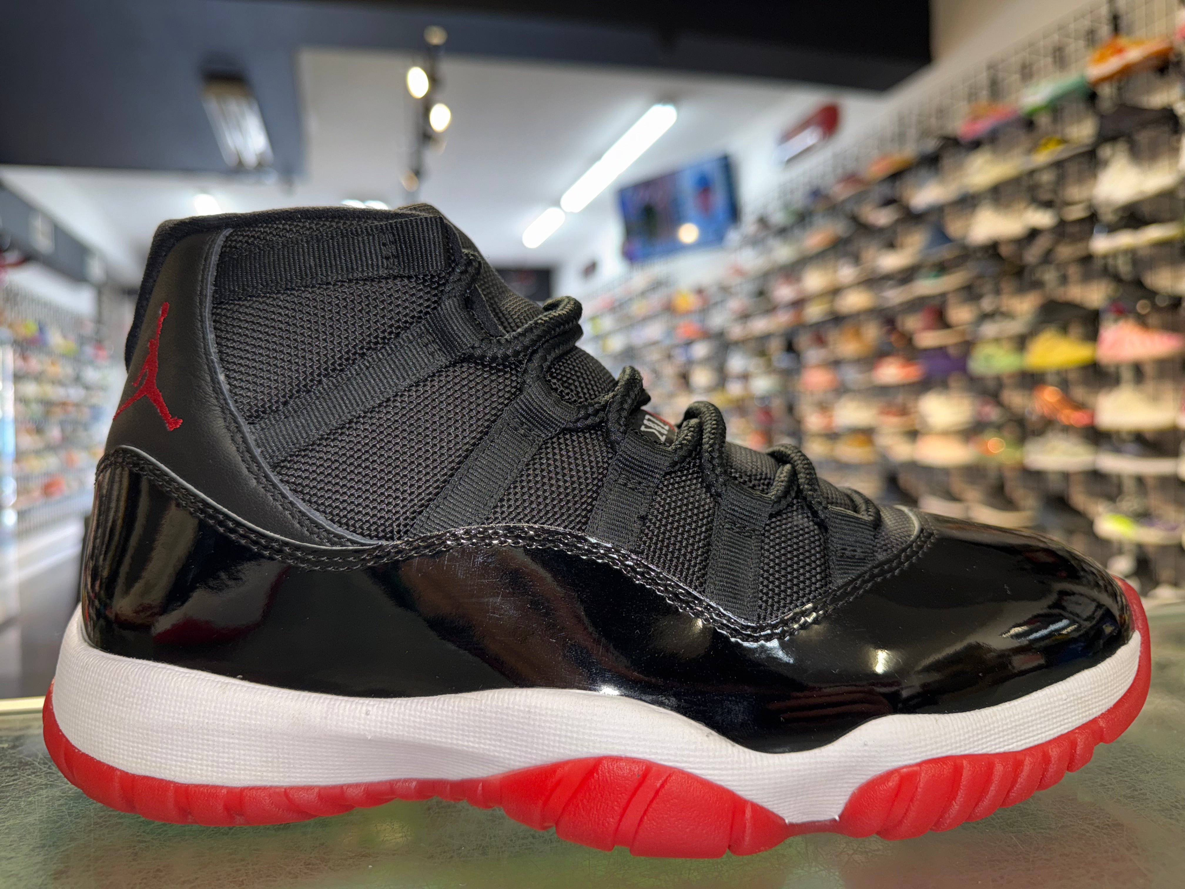 Size 8 Air Jordan 11 “Bred”
