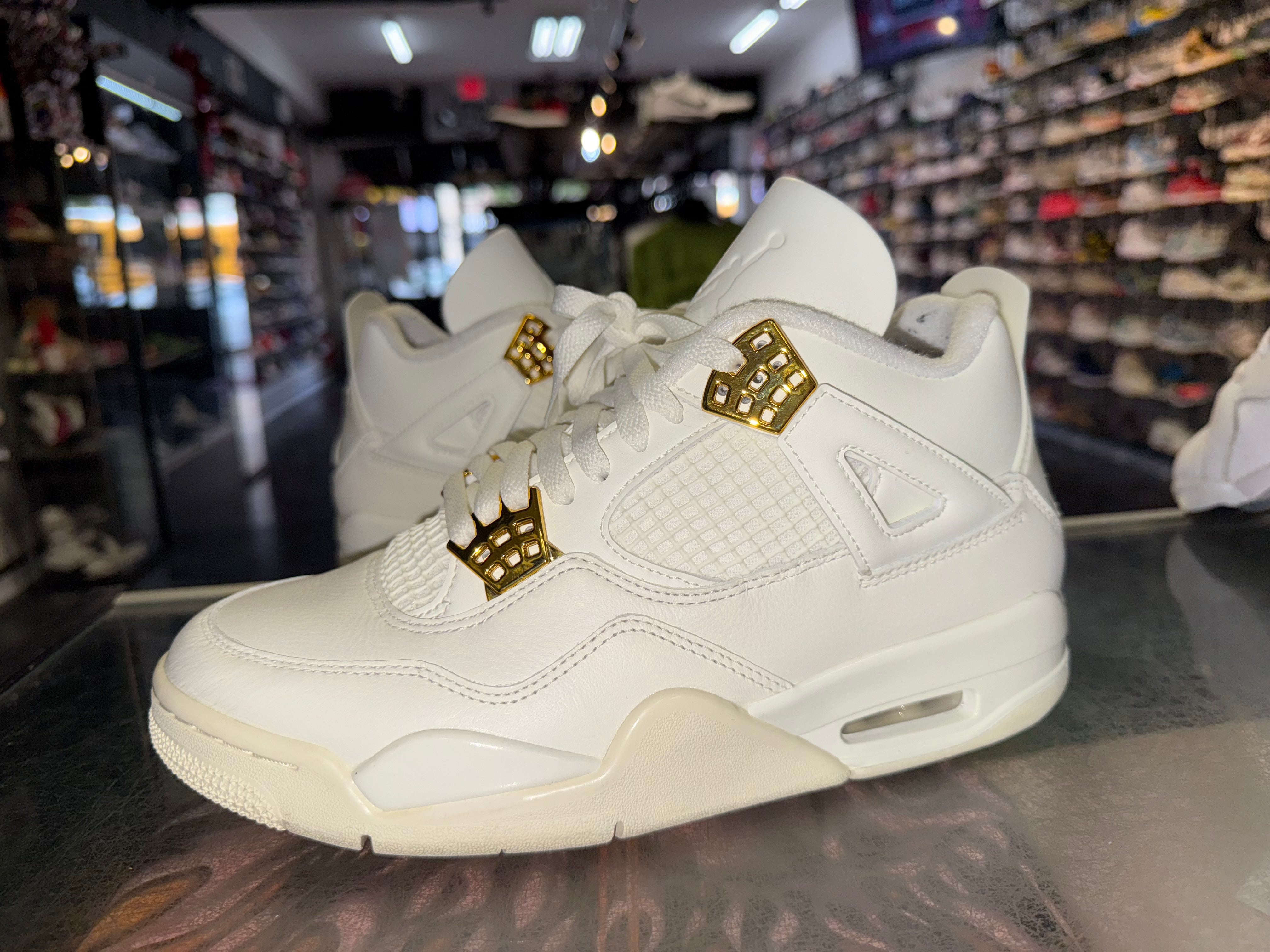 Size 7.5 (9W) Air Jordan 4 “Metallic Gold”