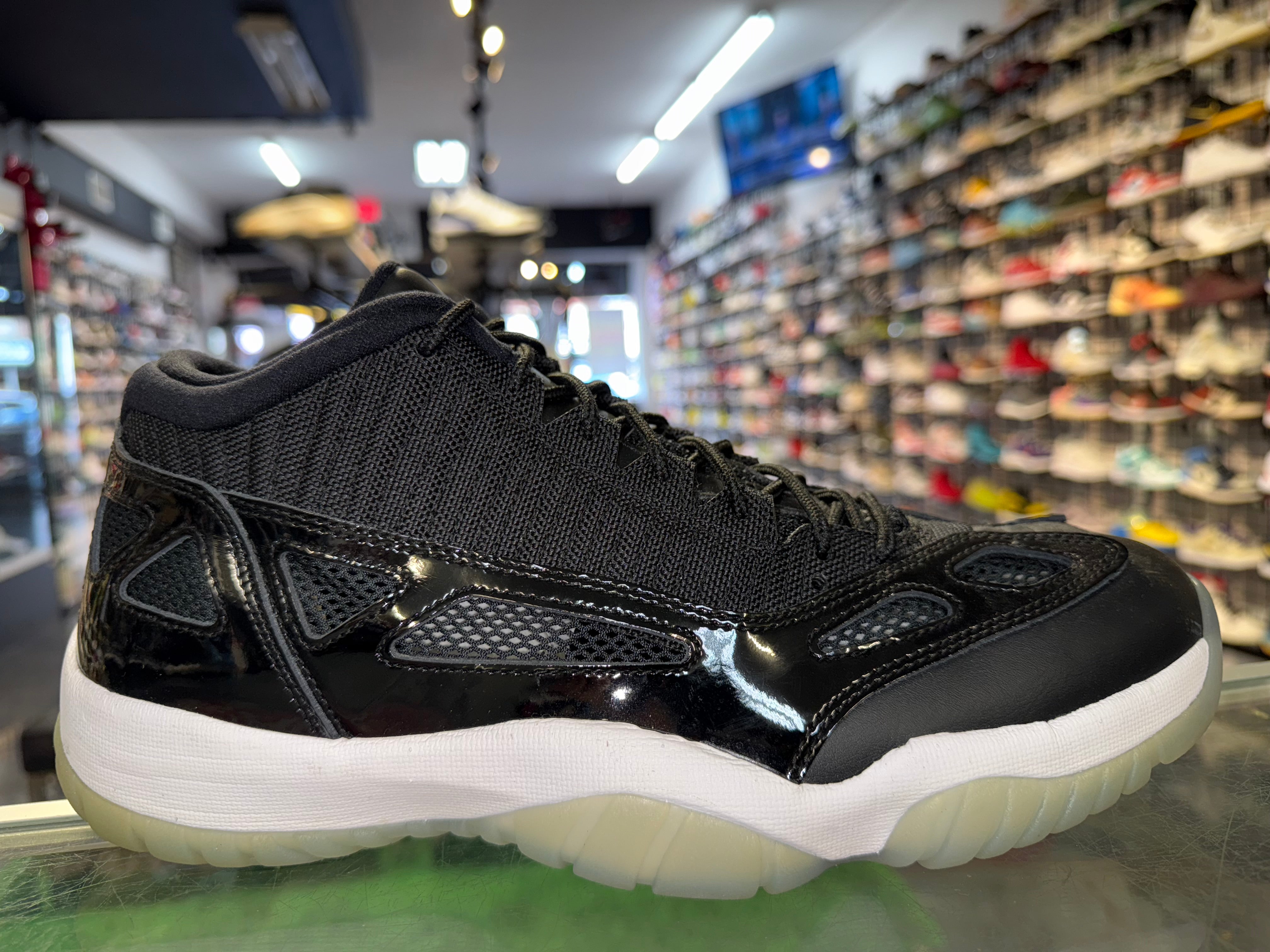 Size 11.5 Air Jordan 11 Low IE "Space Jam"