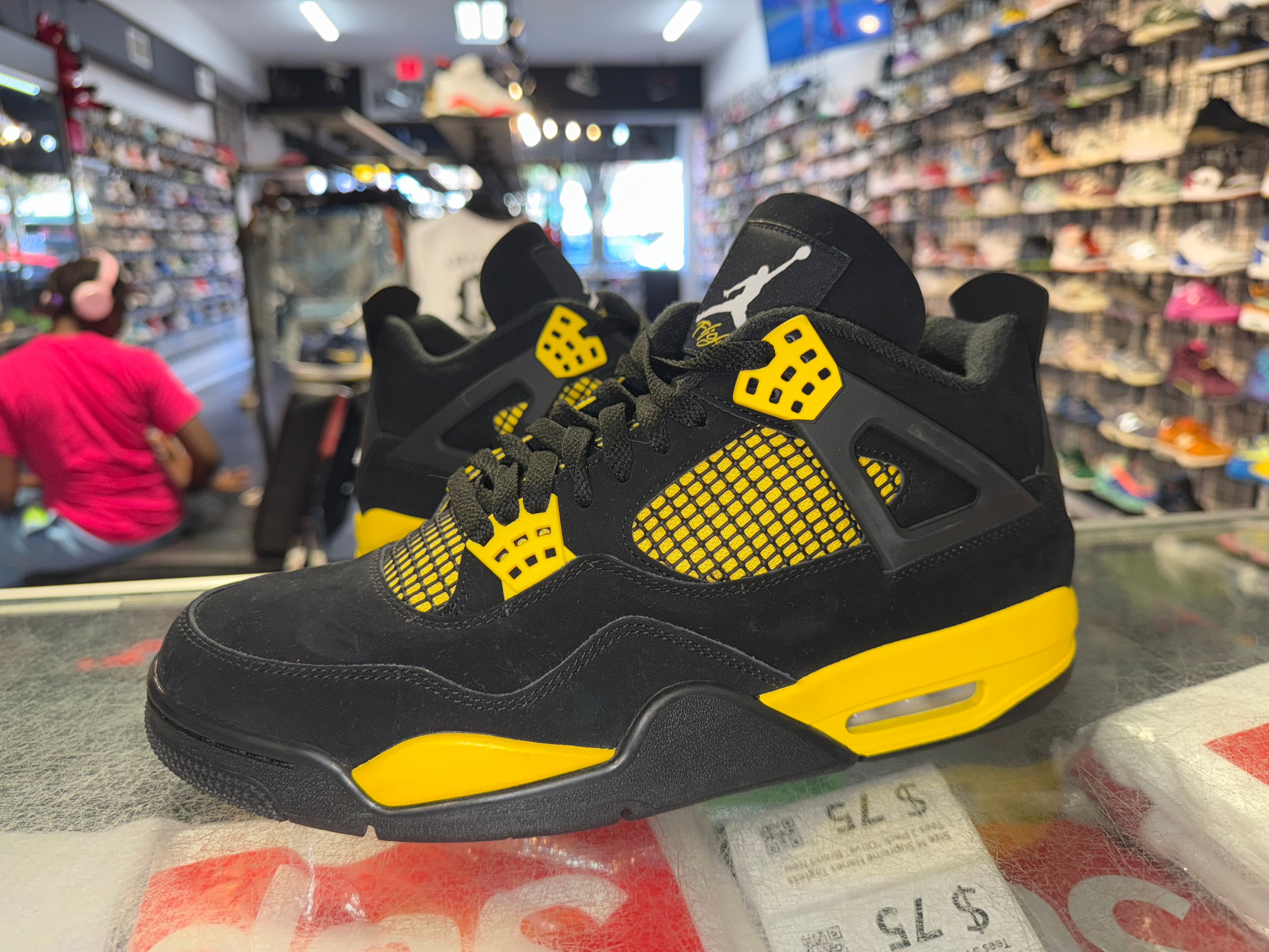 Size 11 Air Jordan 4 "Thunder"