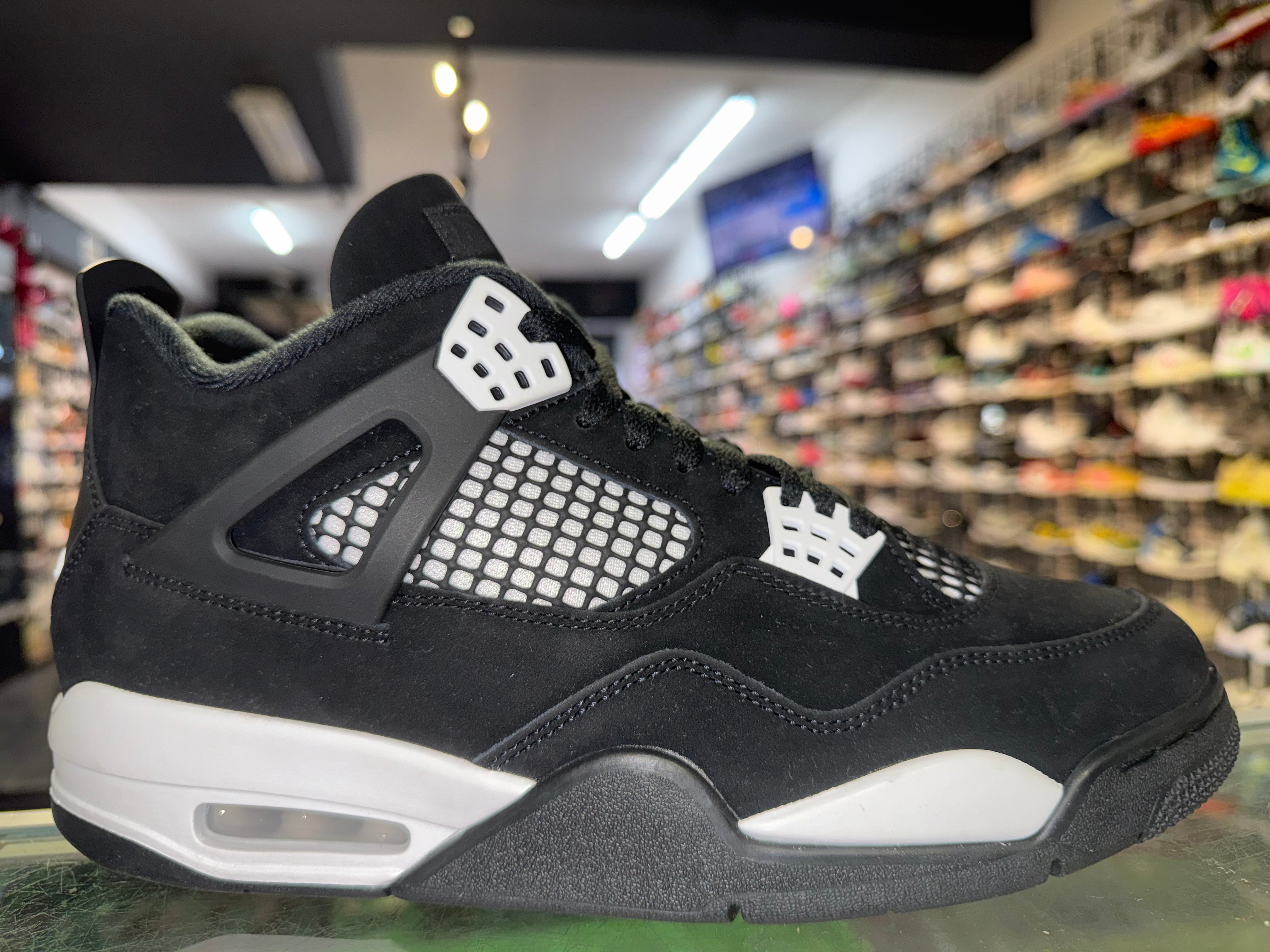 Size 10 Air Jordan 4 "White Thunder"