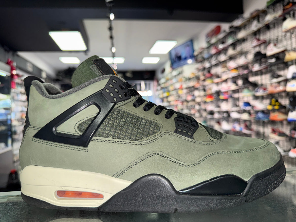 Air Jordan 4 Undefeated sneaker, pre-owned, size 12