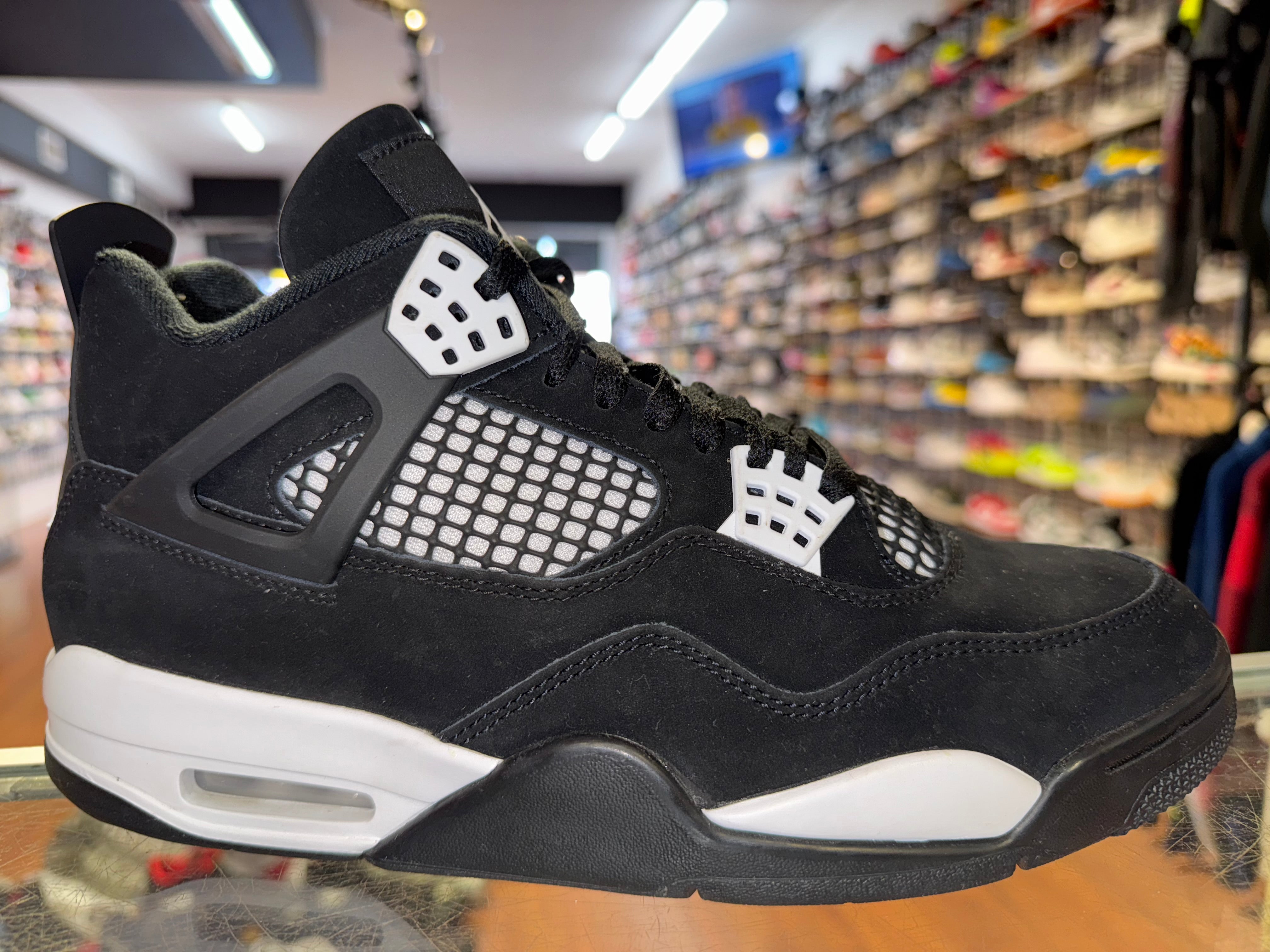 Size 9.5 Air Jordan 4 "White Thunder"