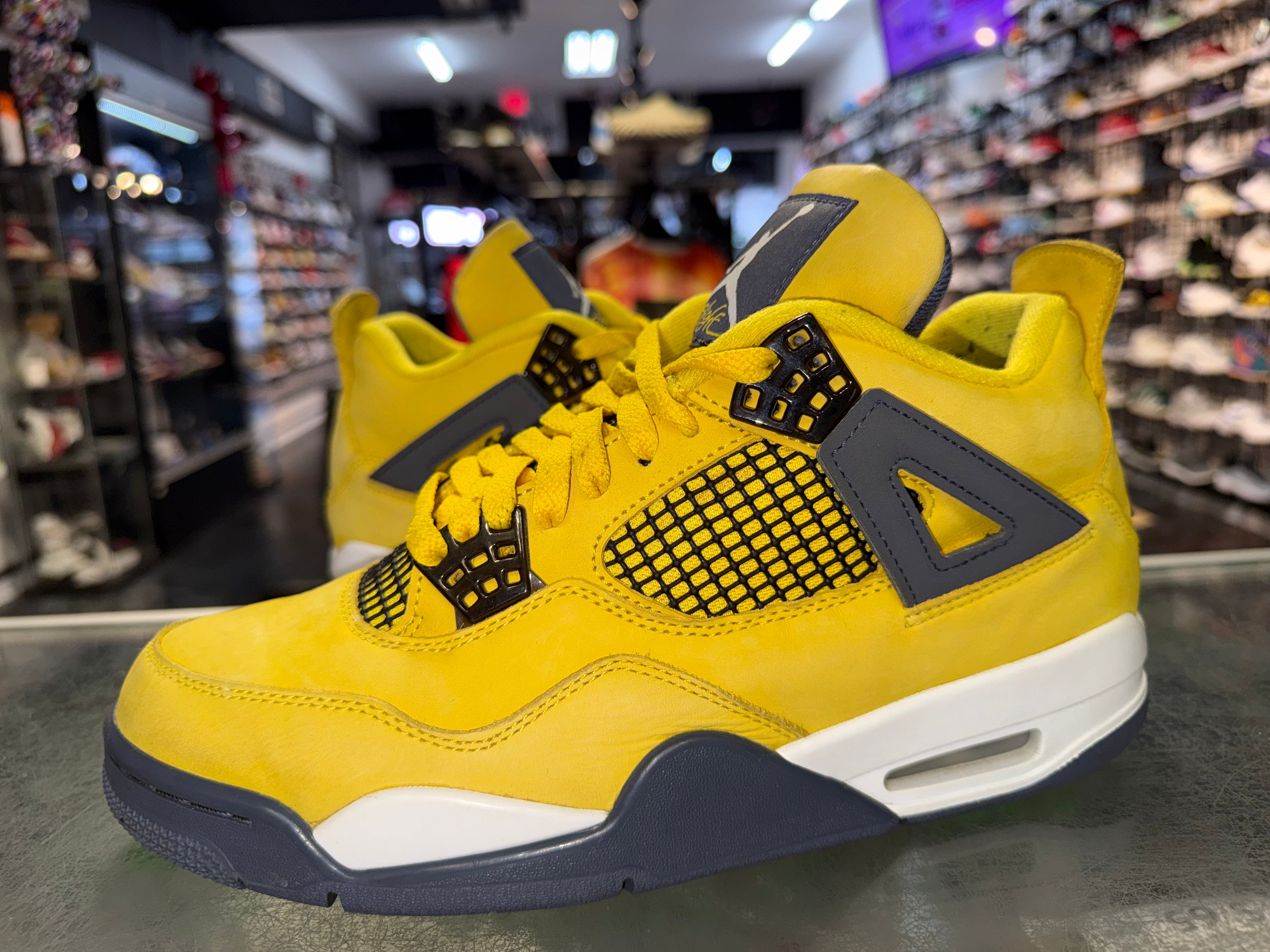 Size 9.5 Air Jordan 4 “Lightning”