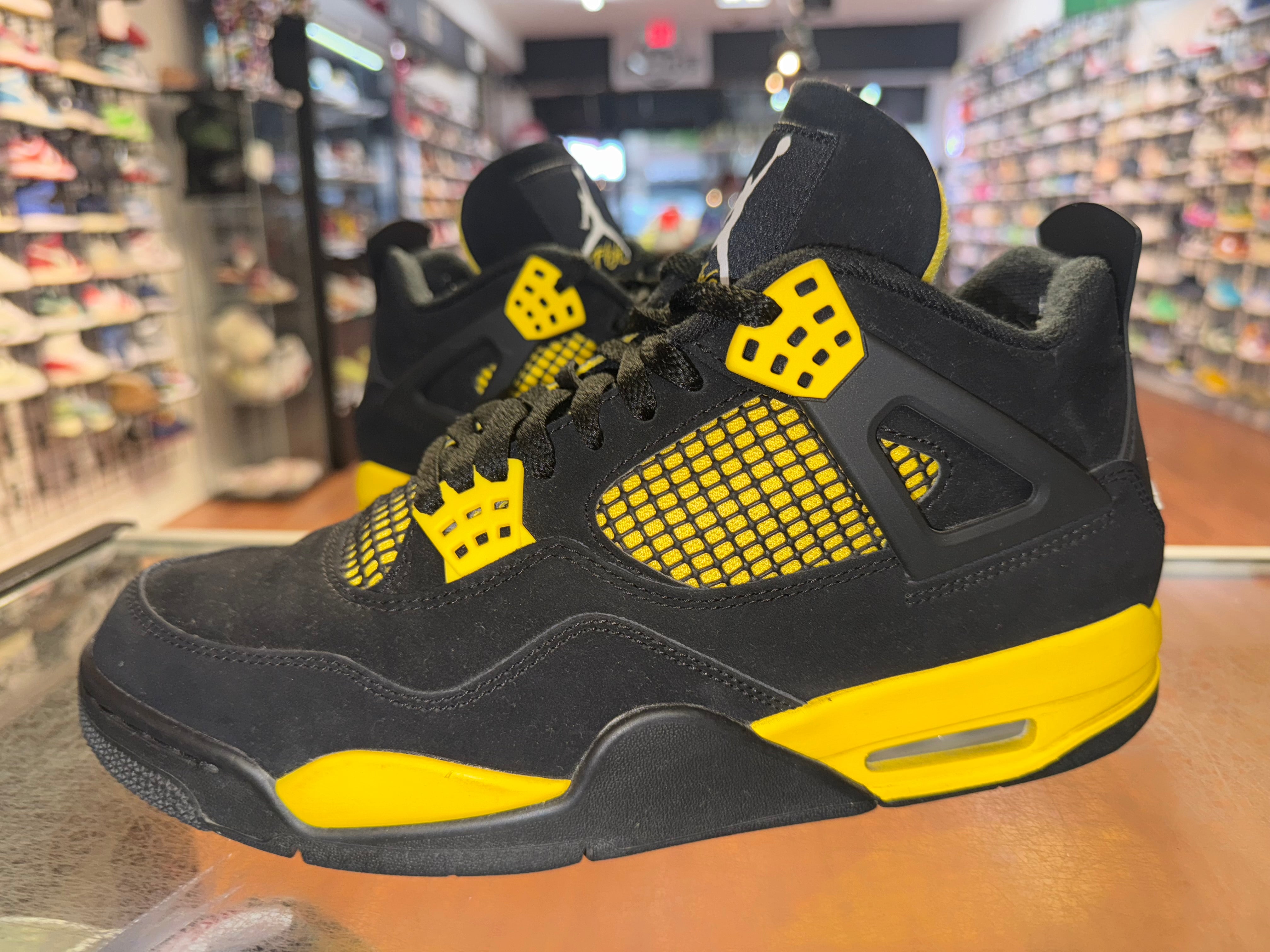 Size 9.5 Air Jordan 4 "Thunder"