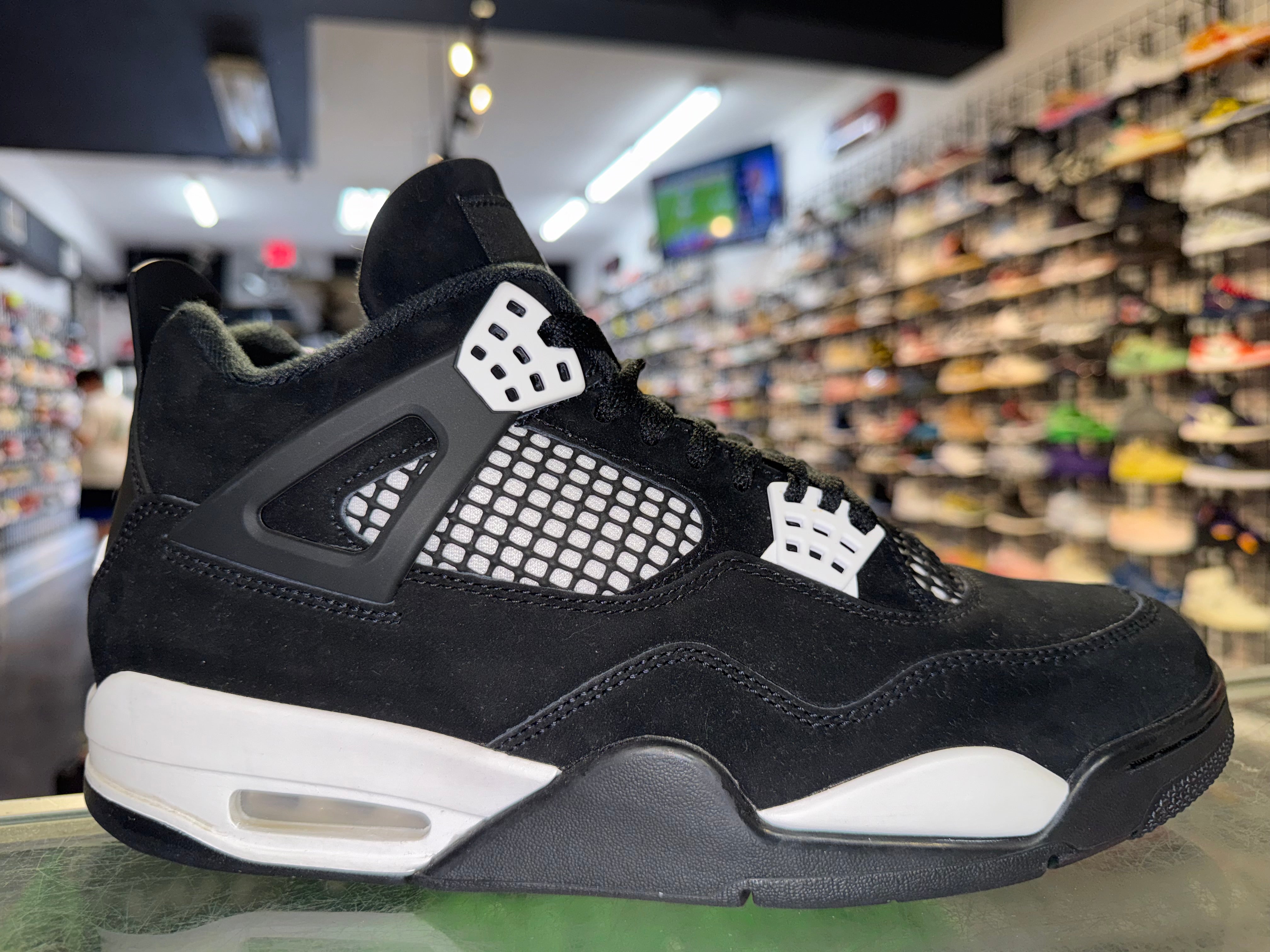 Size 9.5 Air Jordan 4 "White Thunder"