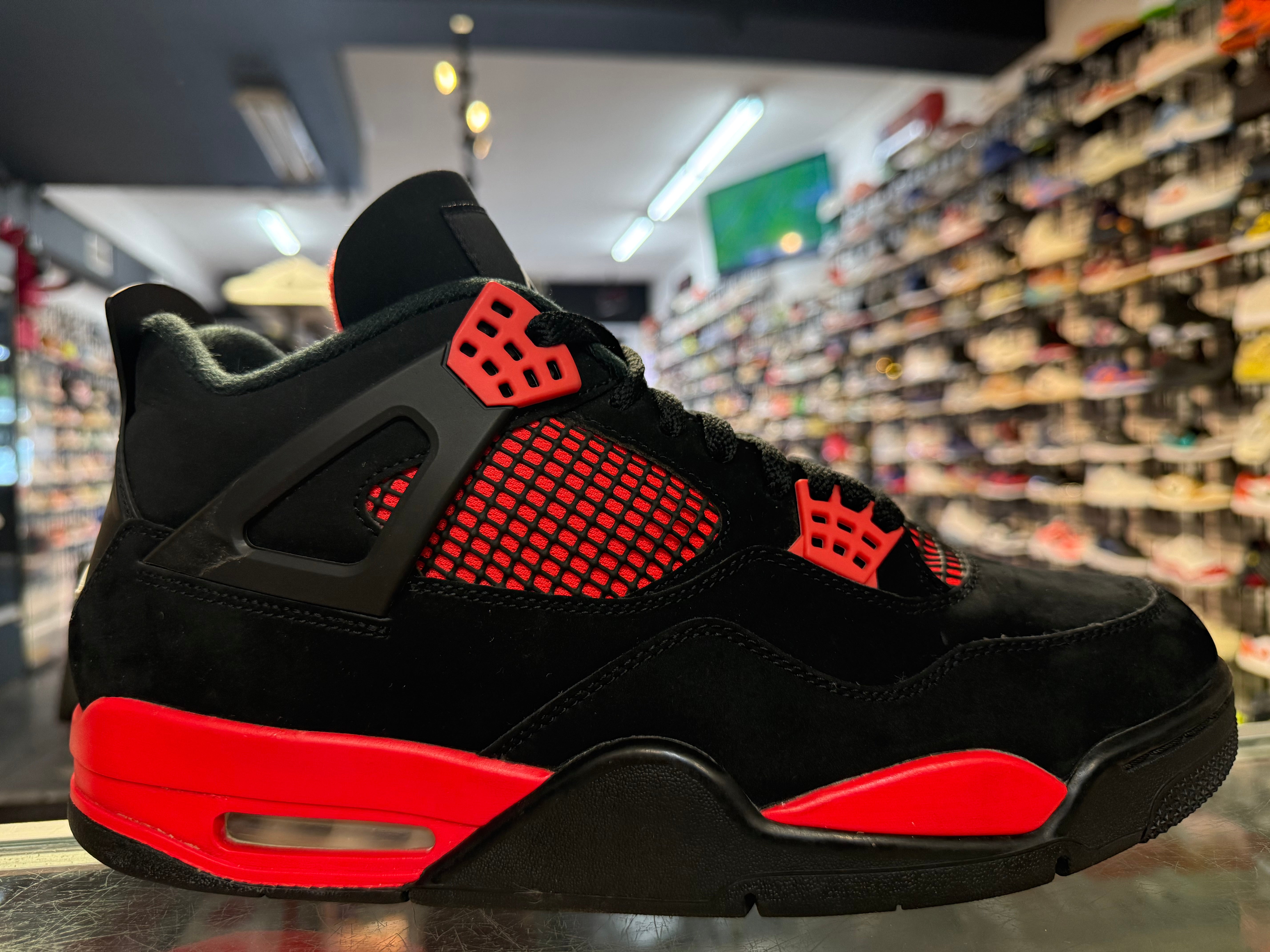 Size 12 Air Jordan 4 “Red Thunder”