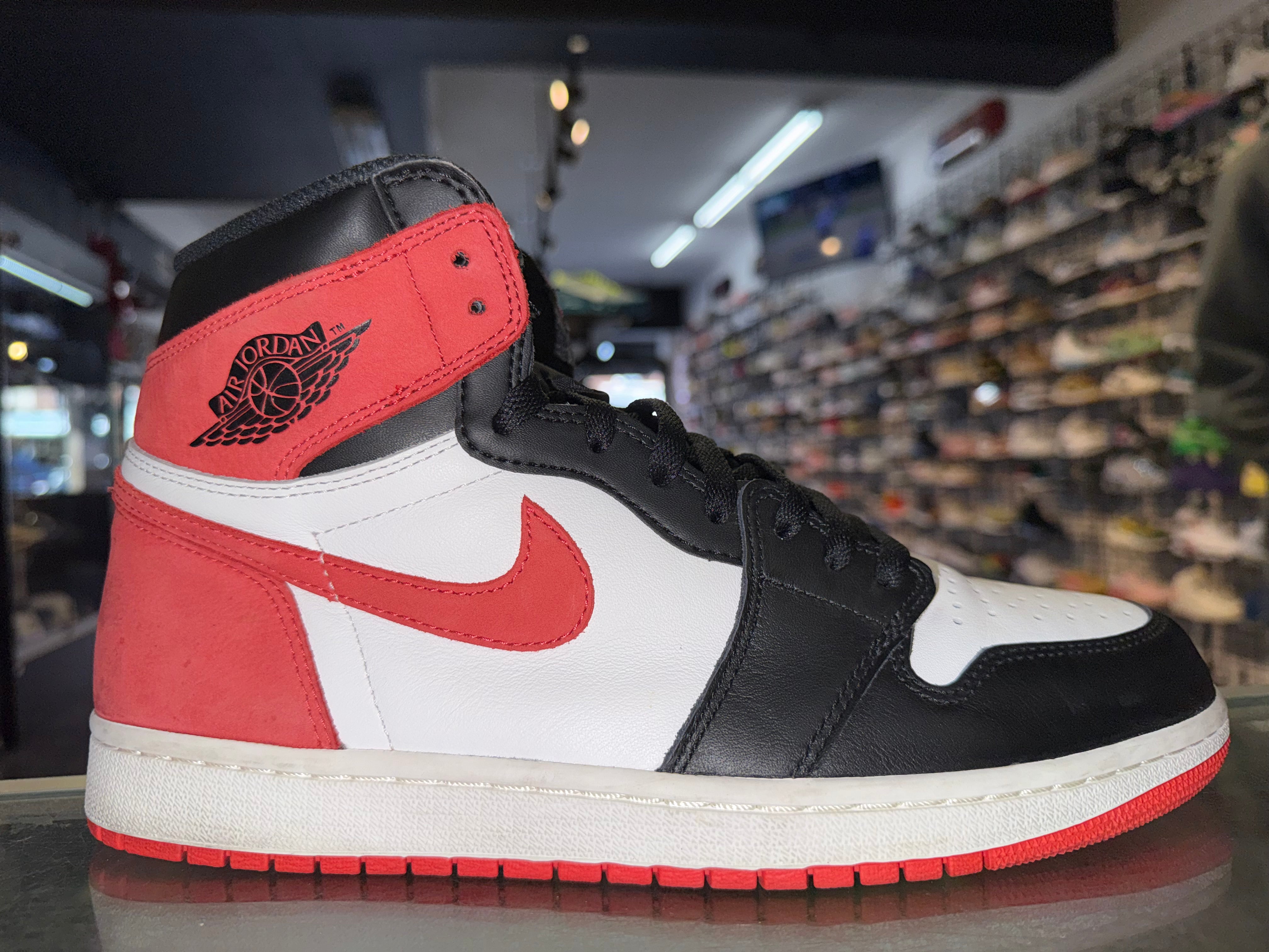 Size 10.5 Air Jordan 1 “Track Red”