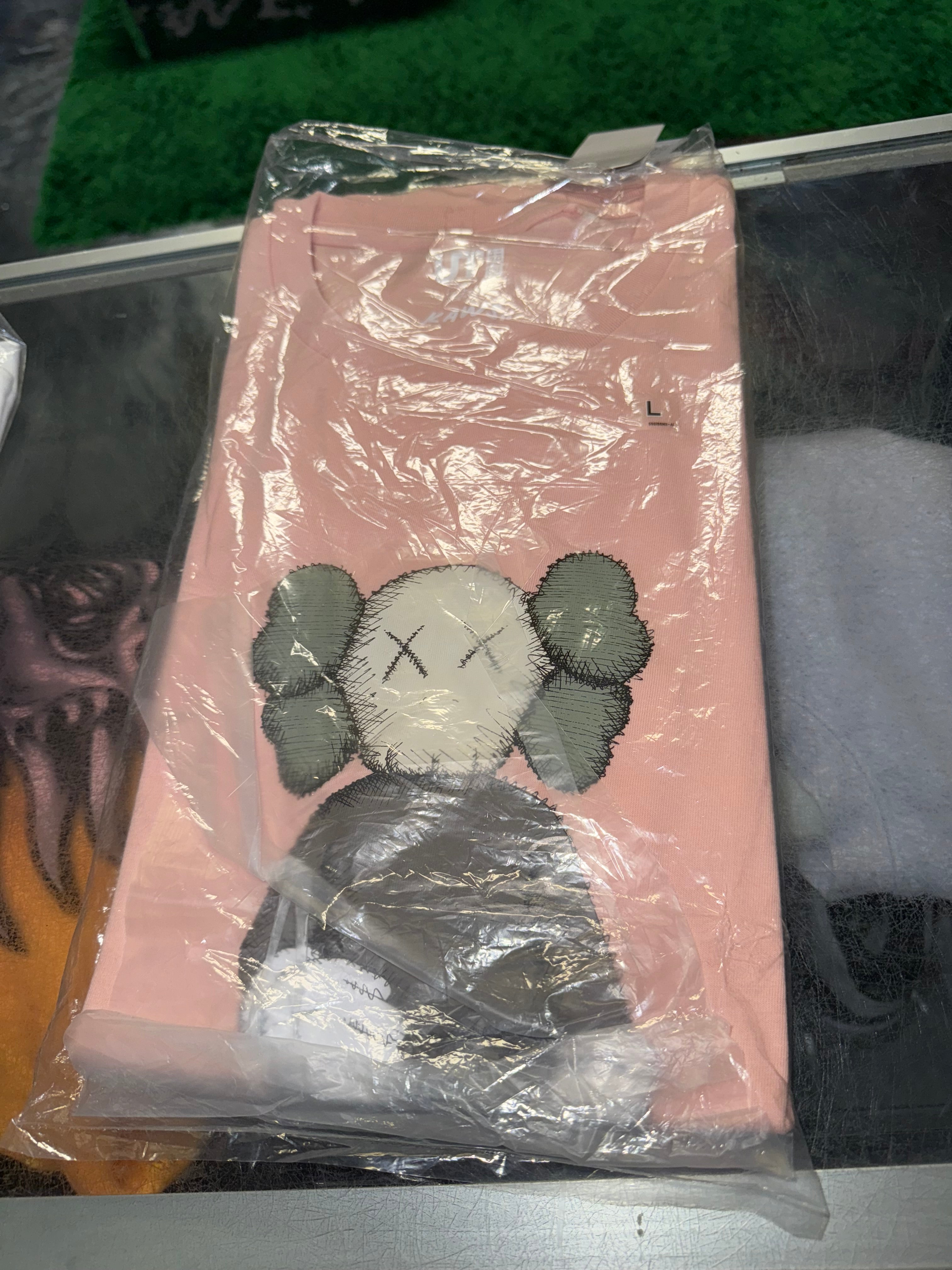 Size L Kaws x Uniqlo Companion Tee “Pink” Brand New