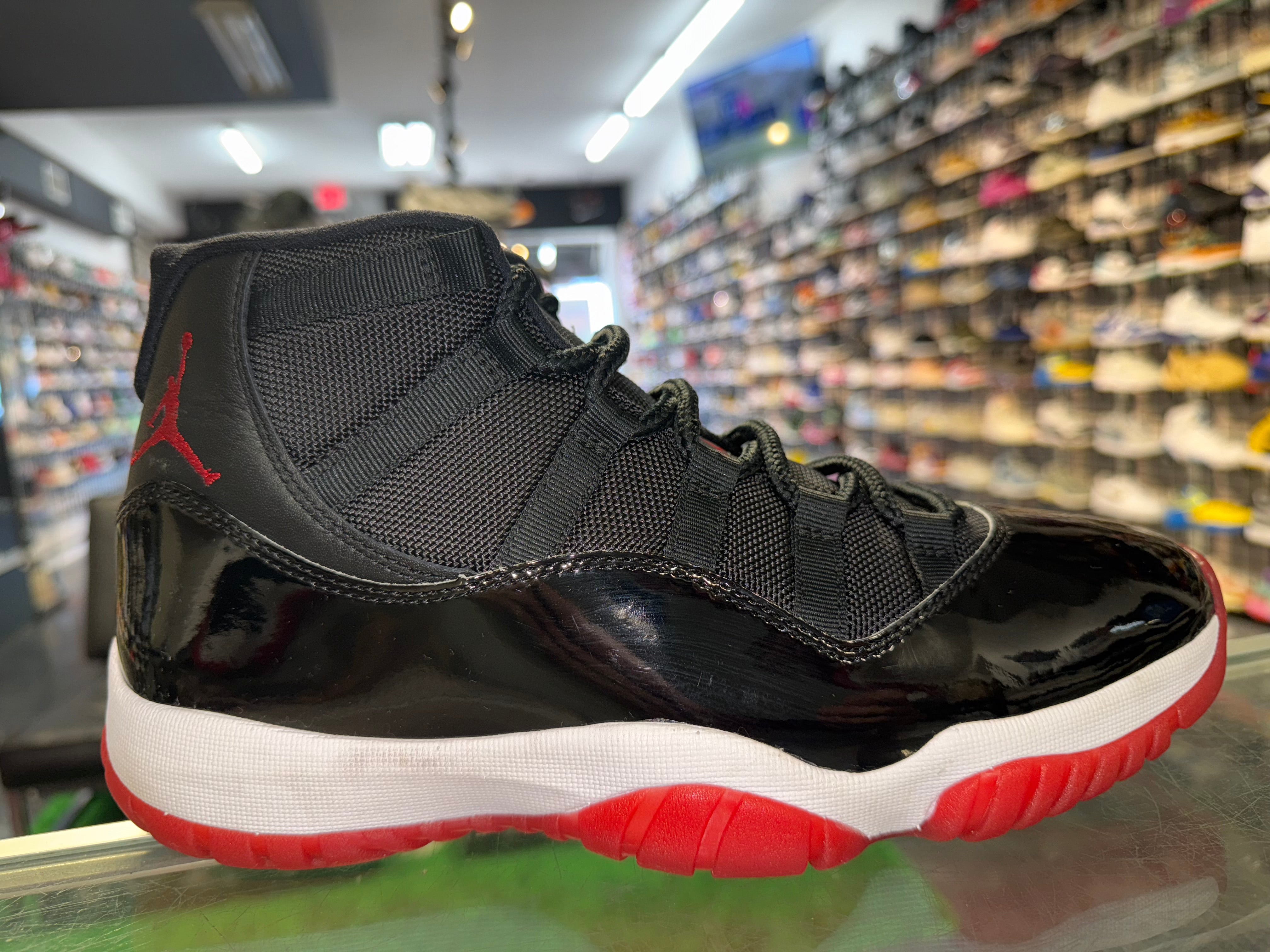 Size 9.5 Air Jordan 11 “Bred”