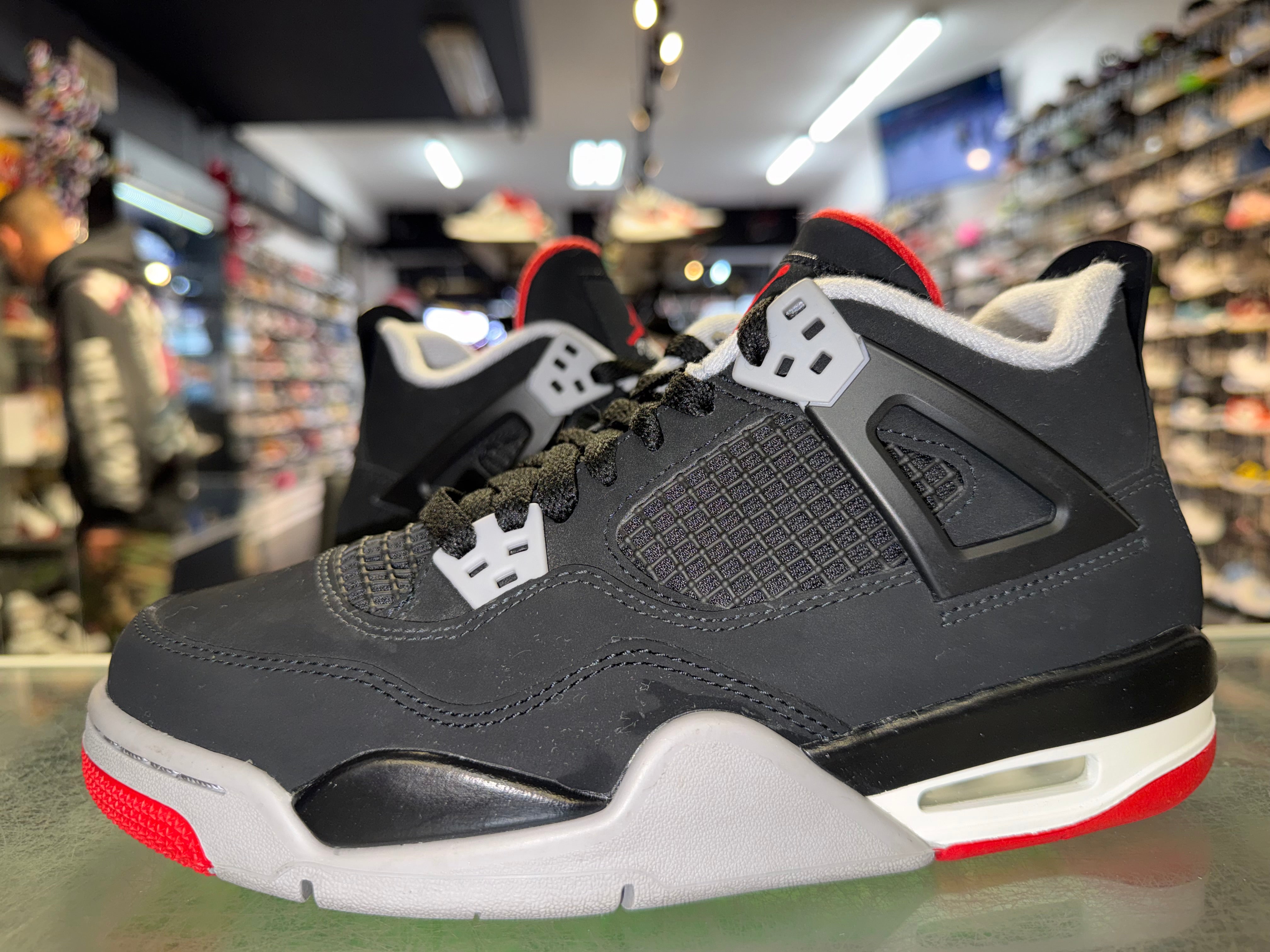 Size 6y Air Jordan 4 "Bred" 2019