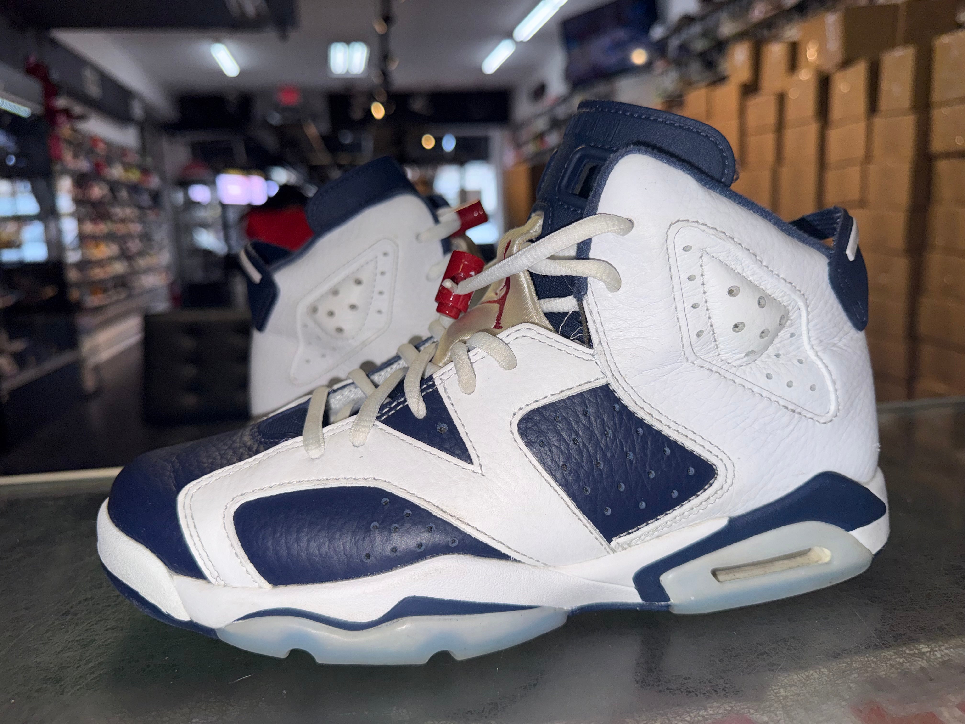 Size 7y Air Jordan 6 "Olympic"