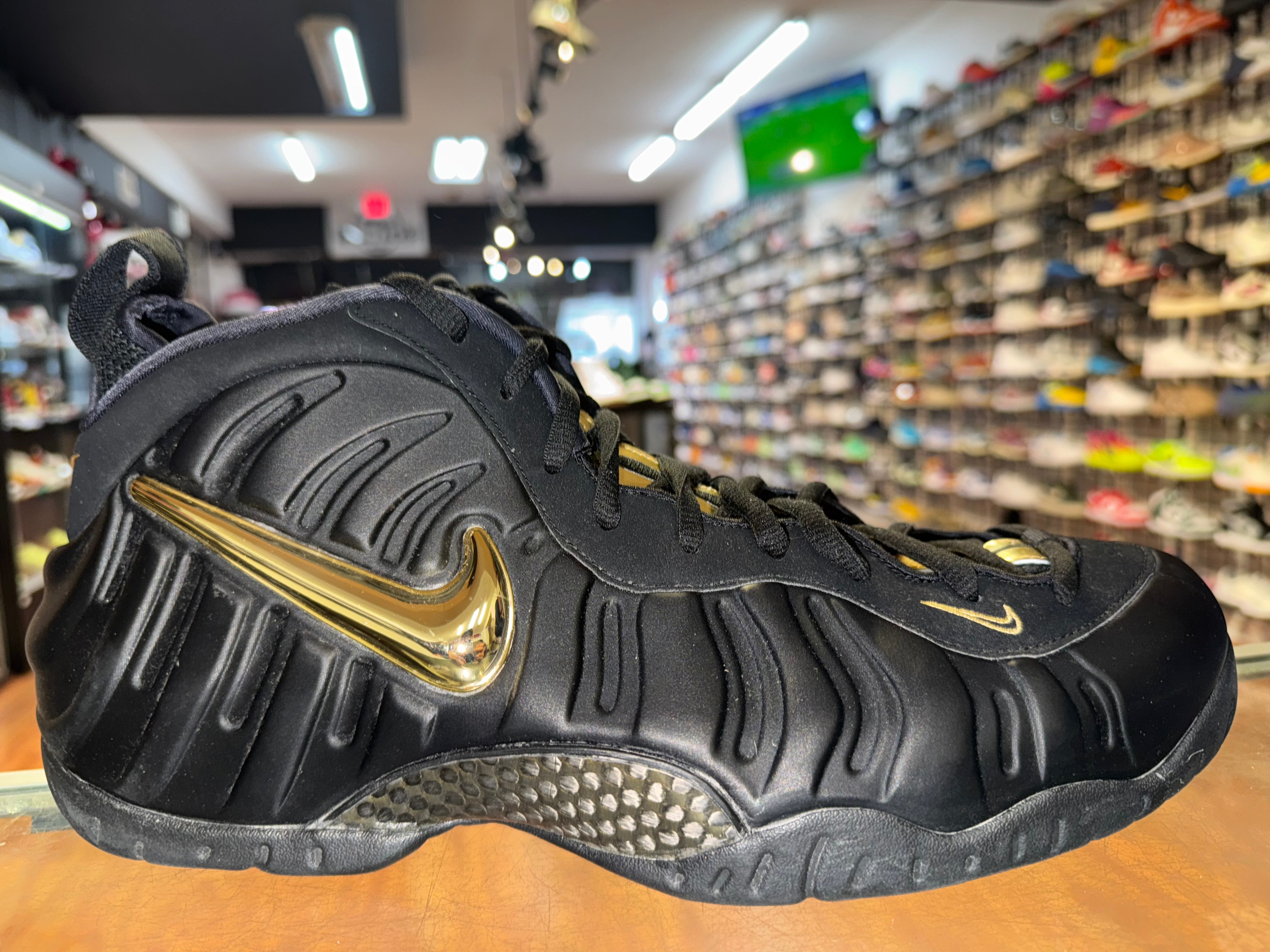 Size 14 Foamposite Pro "Black Metallic Gold"