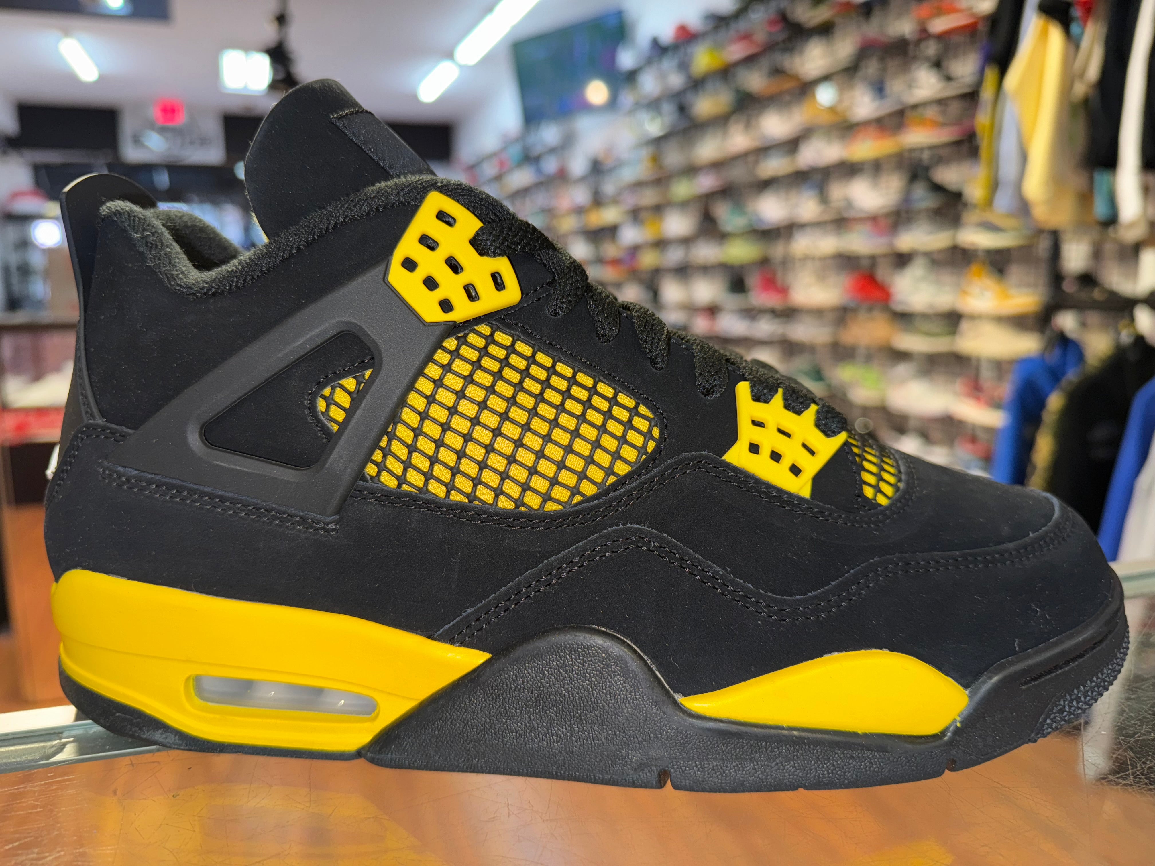 Size 9 Air Jordan 4 “Thunder” Brand New
