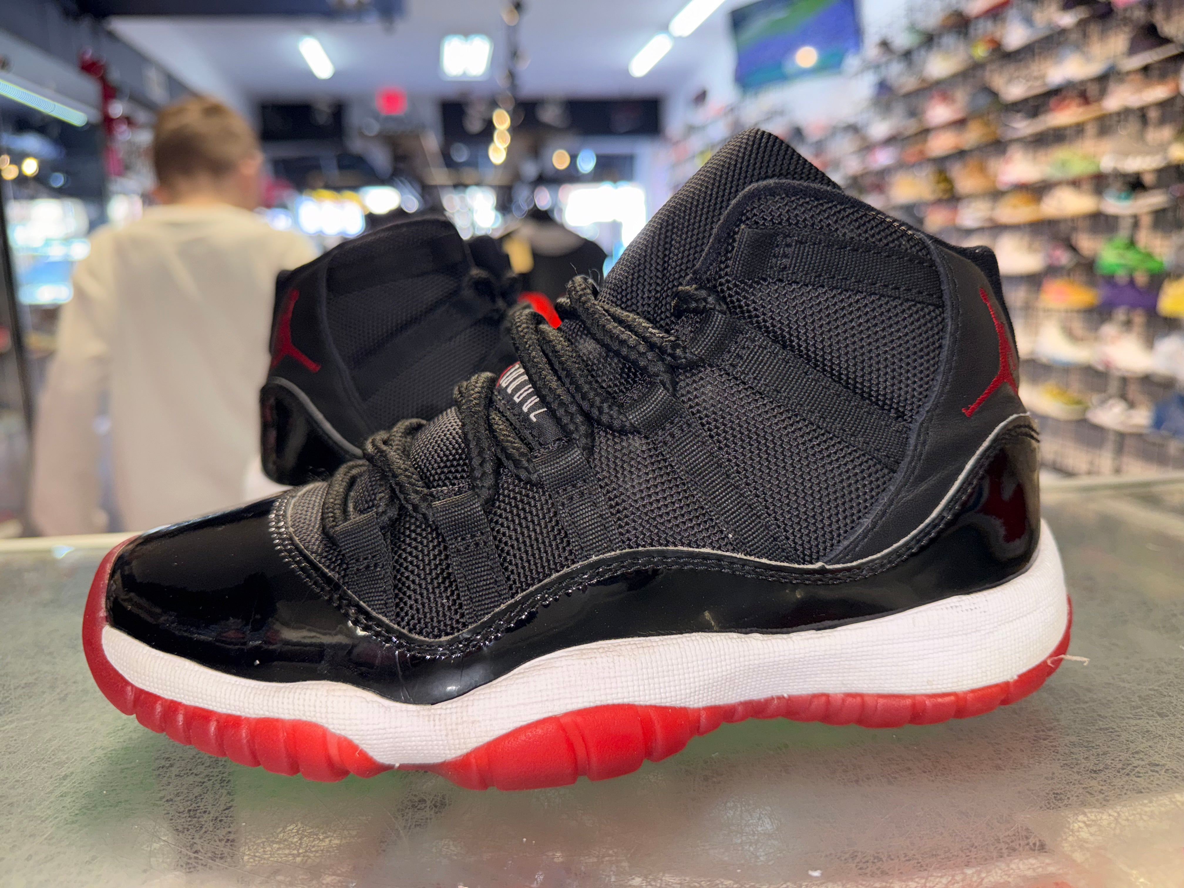 Size 4.5y Air Jordan 11 "Bred"