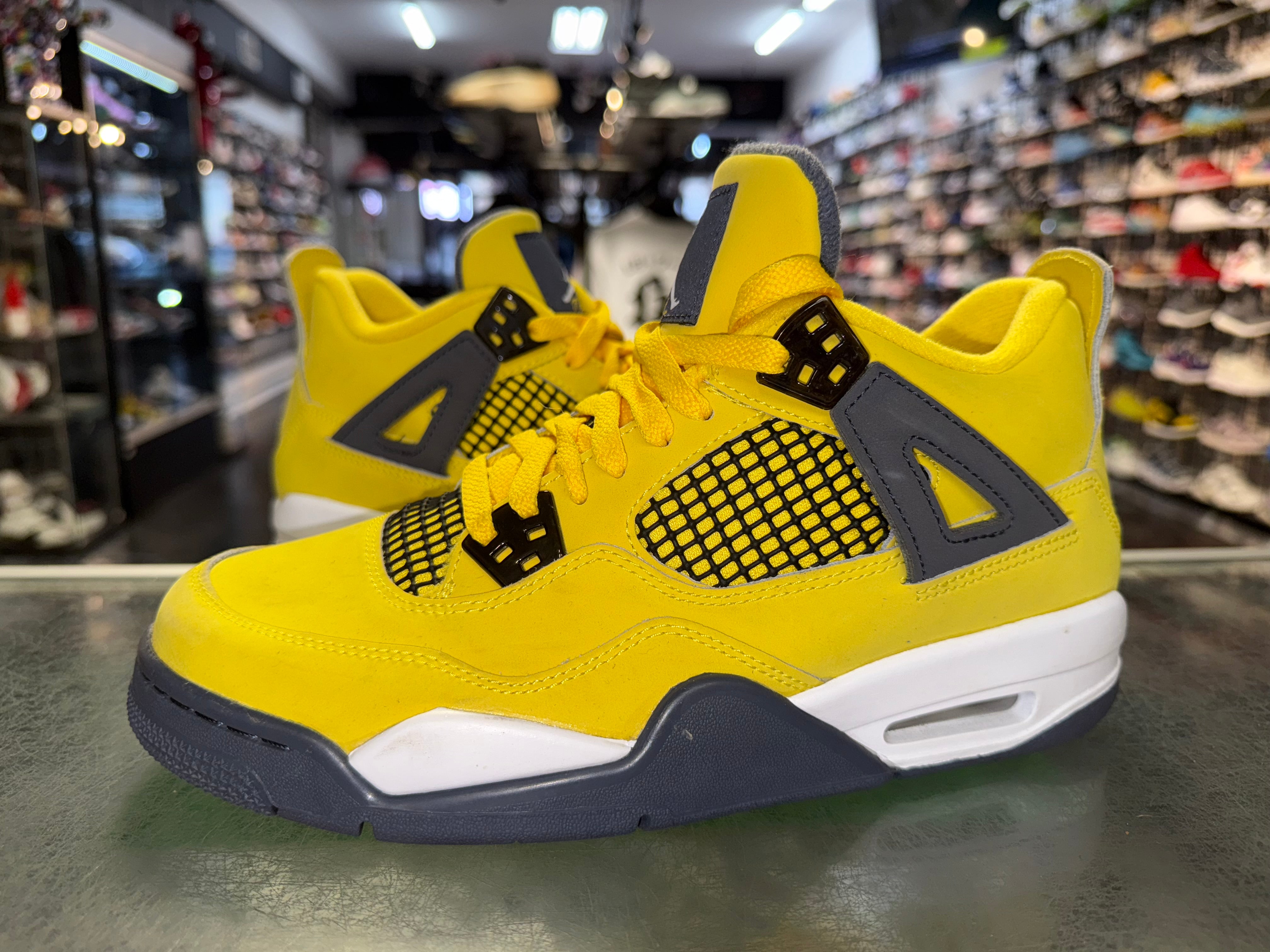 Size 7y Air Jordan 4 "Lightning"