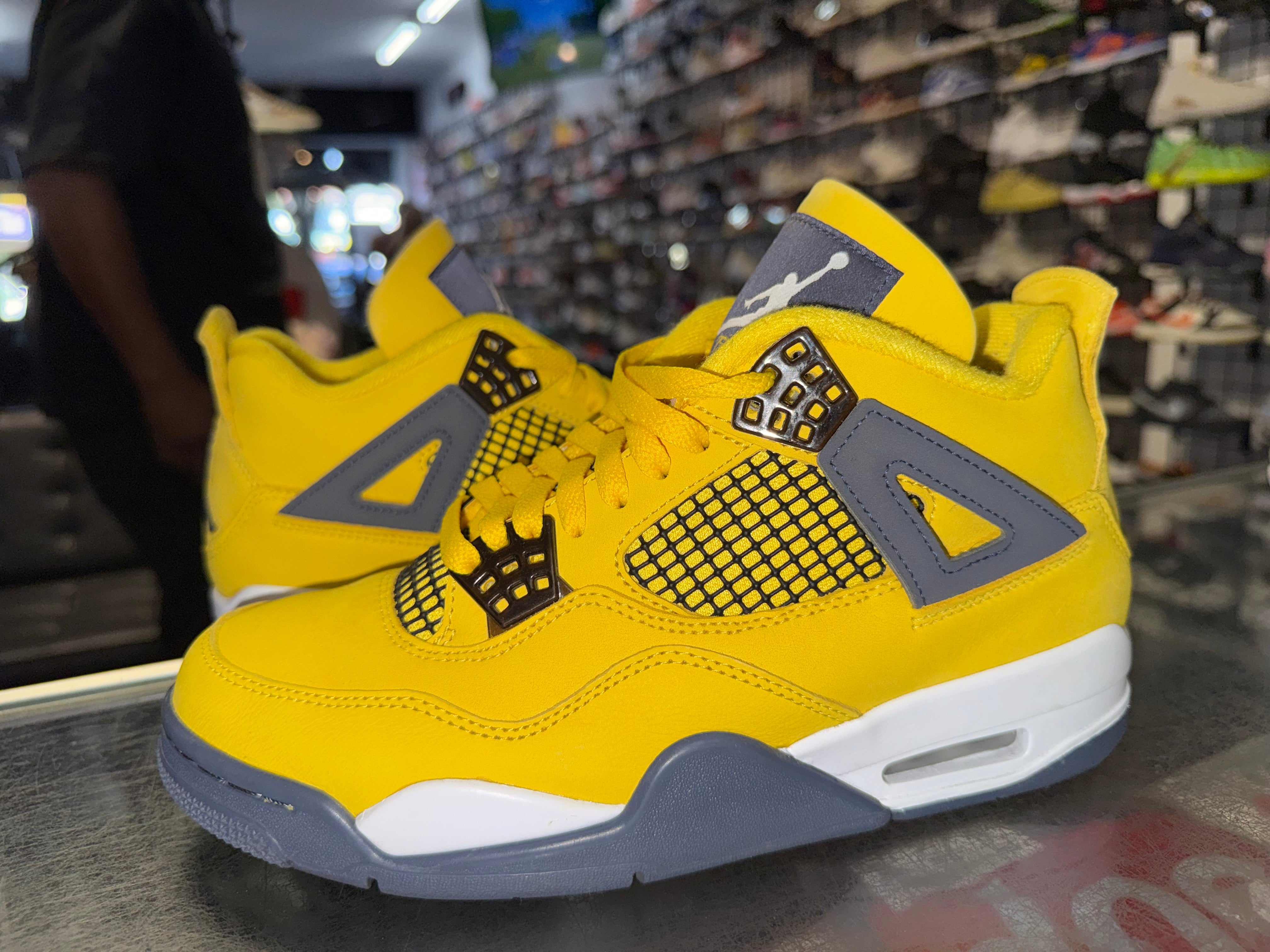 Size 7.5 Air Jordan 4 "Lightning"