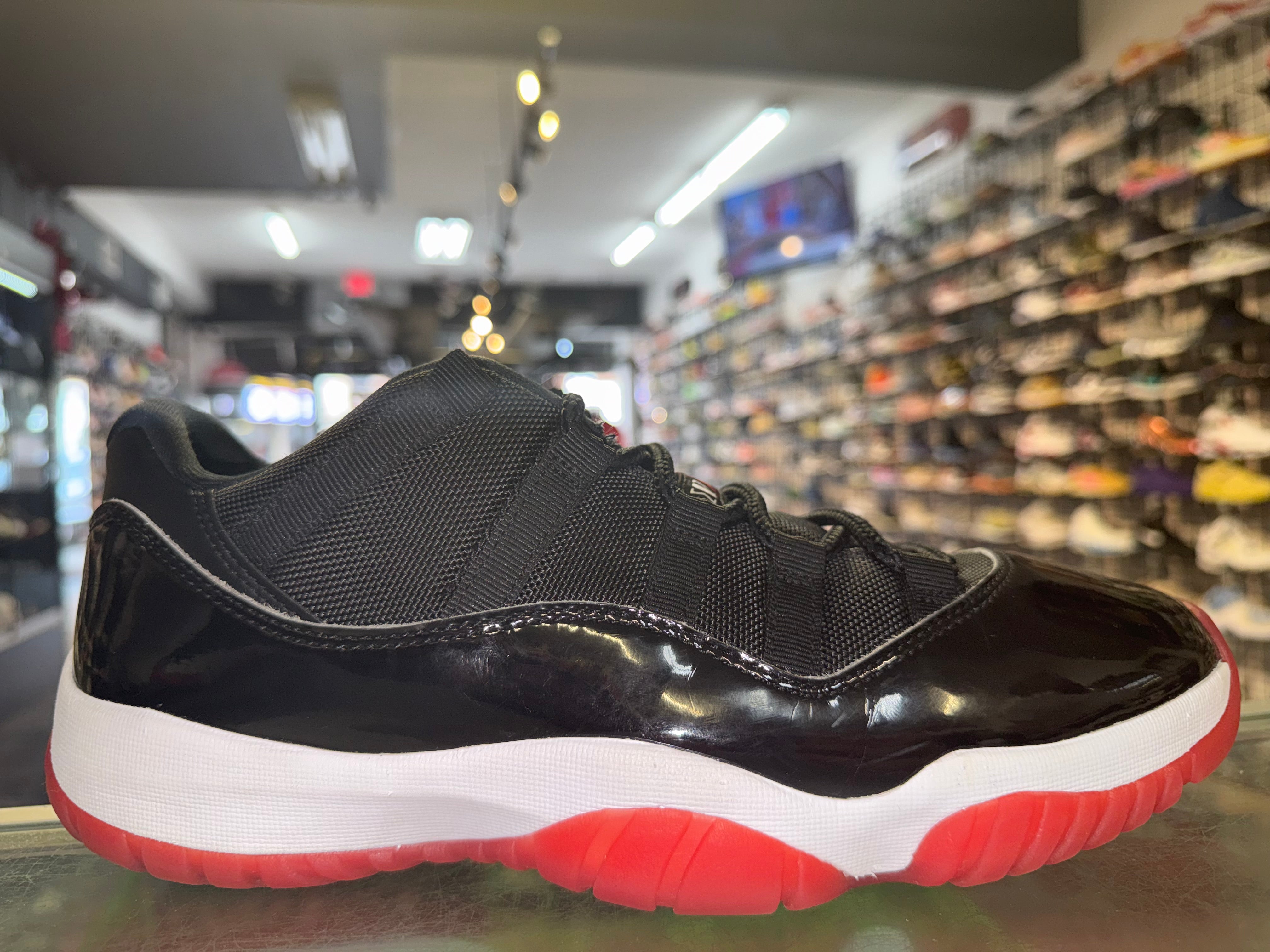 Size 9.5 Air Jordan 11 Low "Bred"