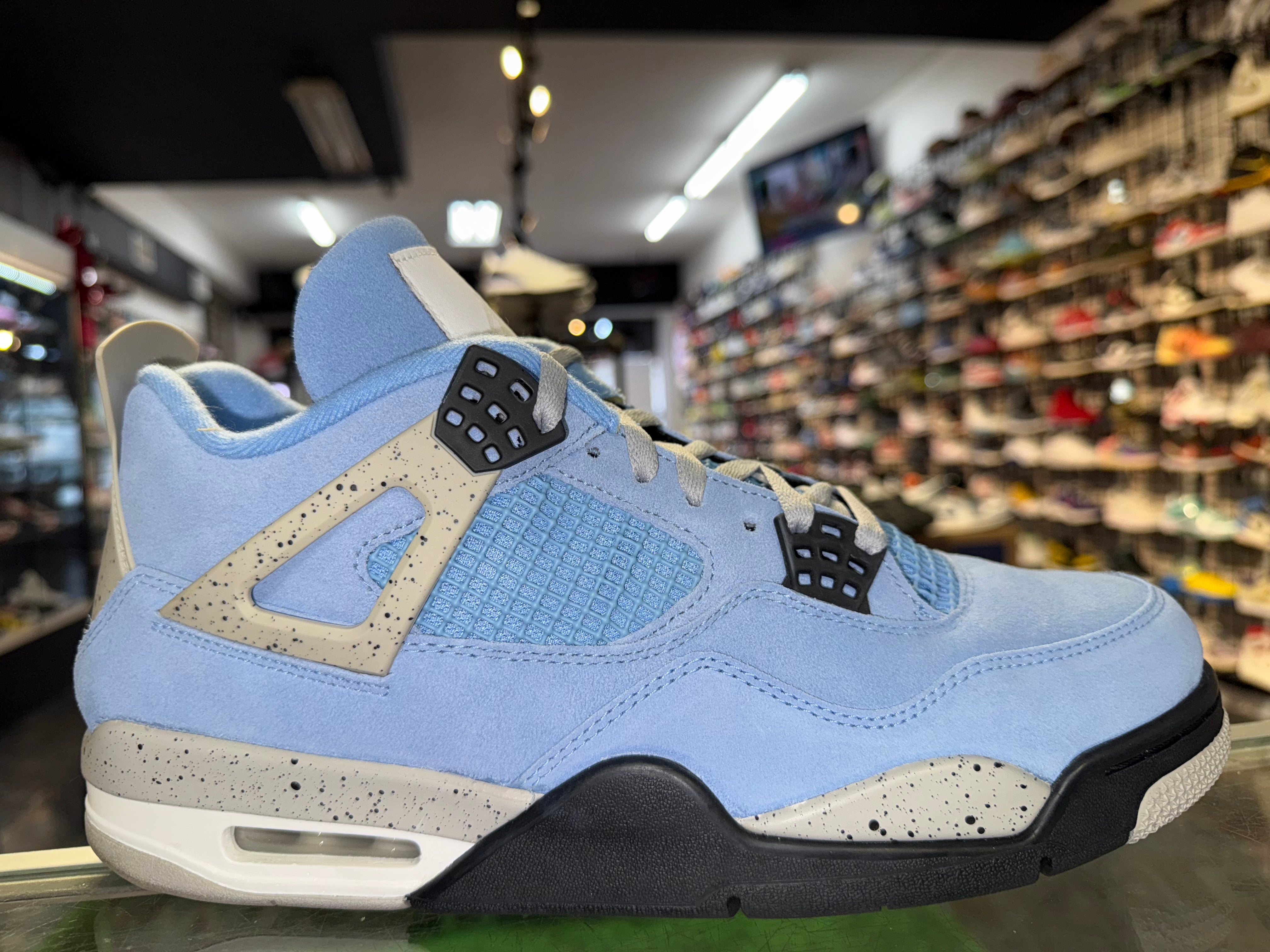Size 11.5 Air Jordan 4 “University Blue”