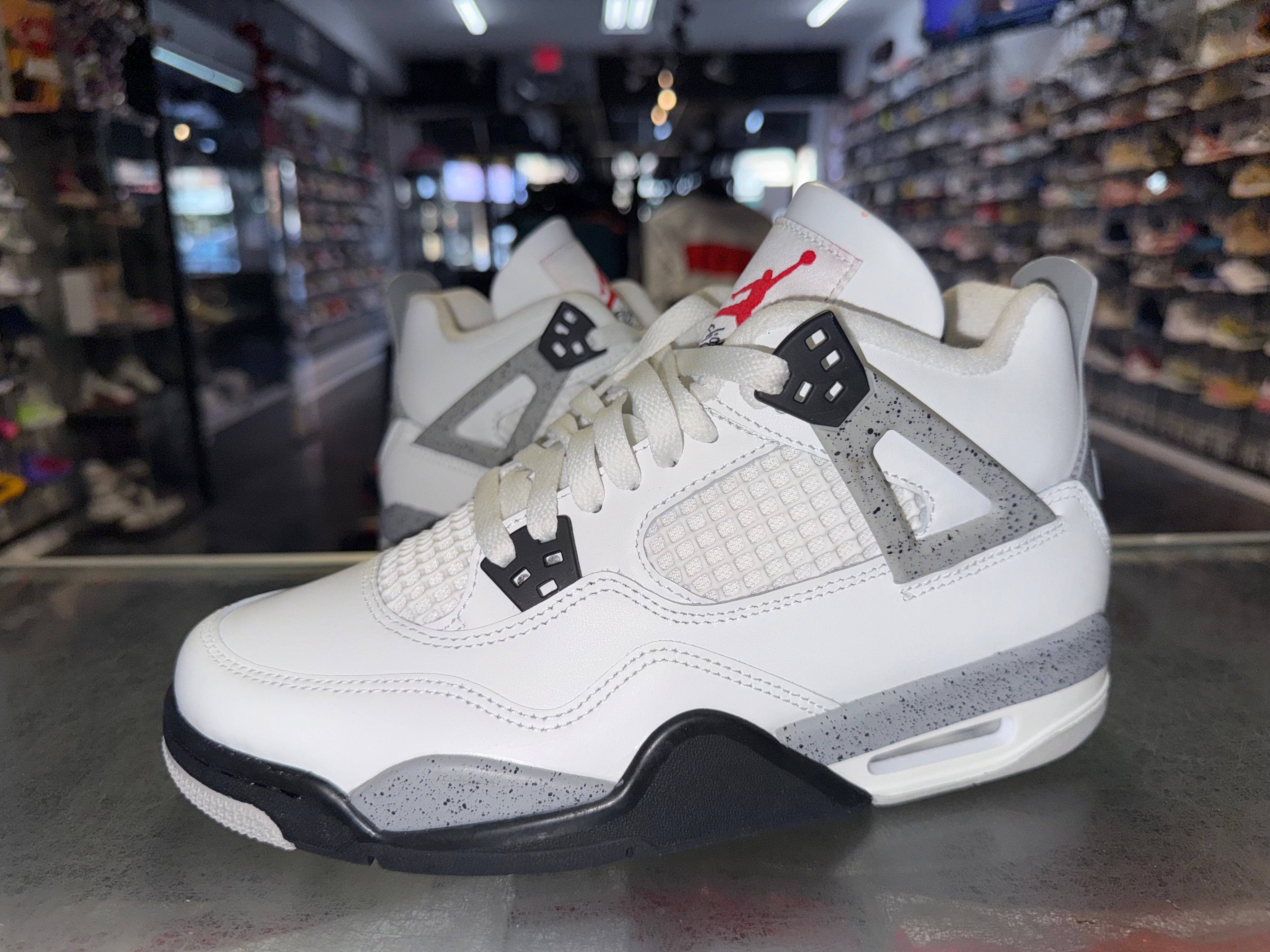 Size 7y Air Jordan 4 "White Cement"