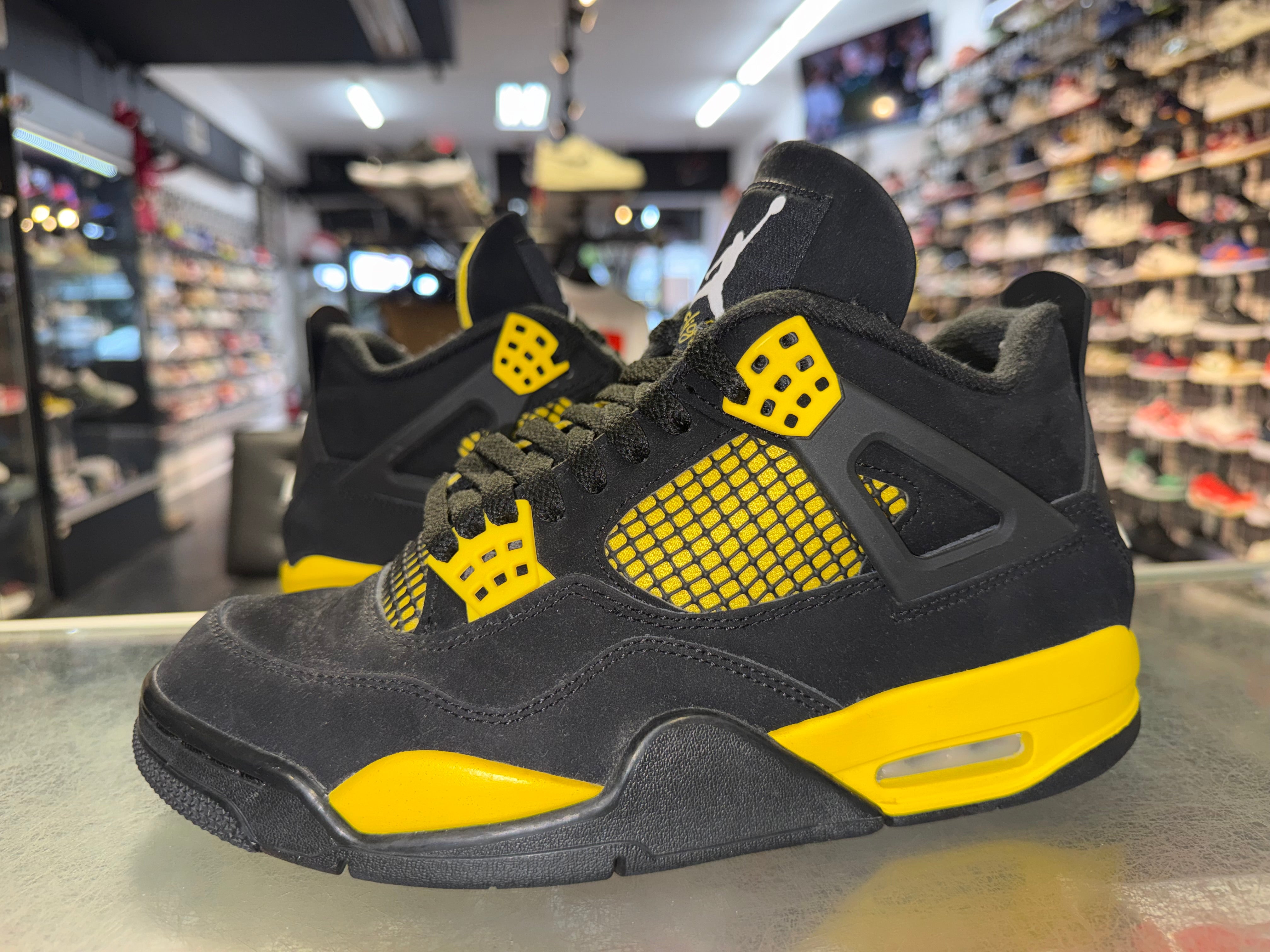 Size 7 Air Jordan 4 "Thunder"