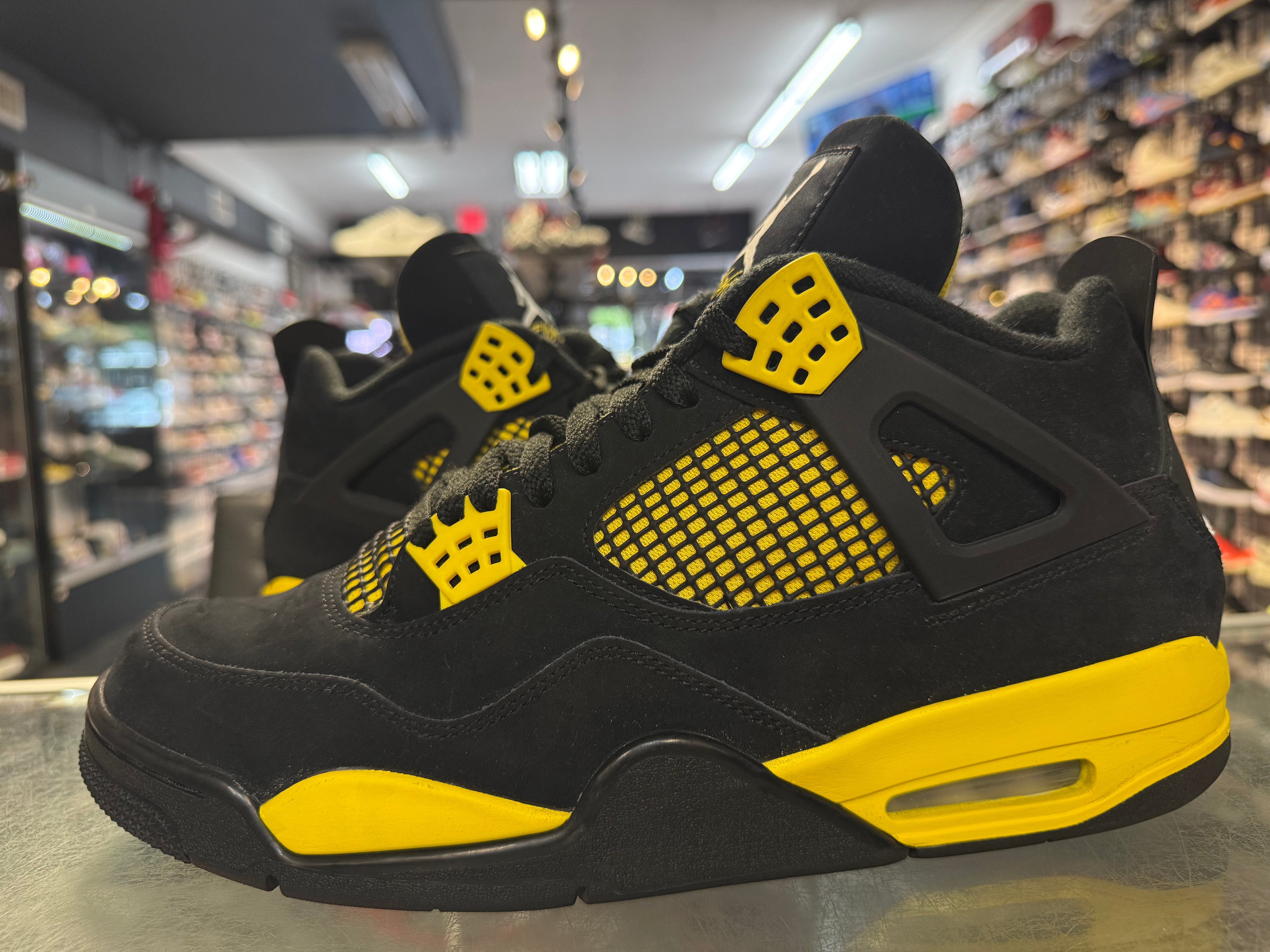 Size 12 Air Jordan 4 “Thunder”