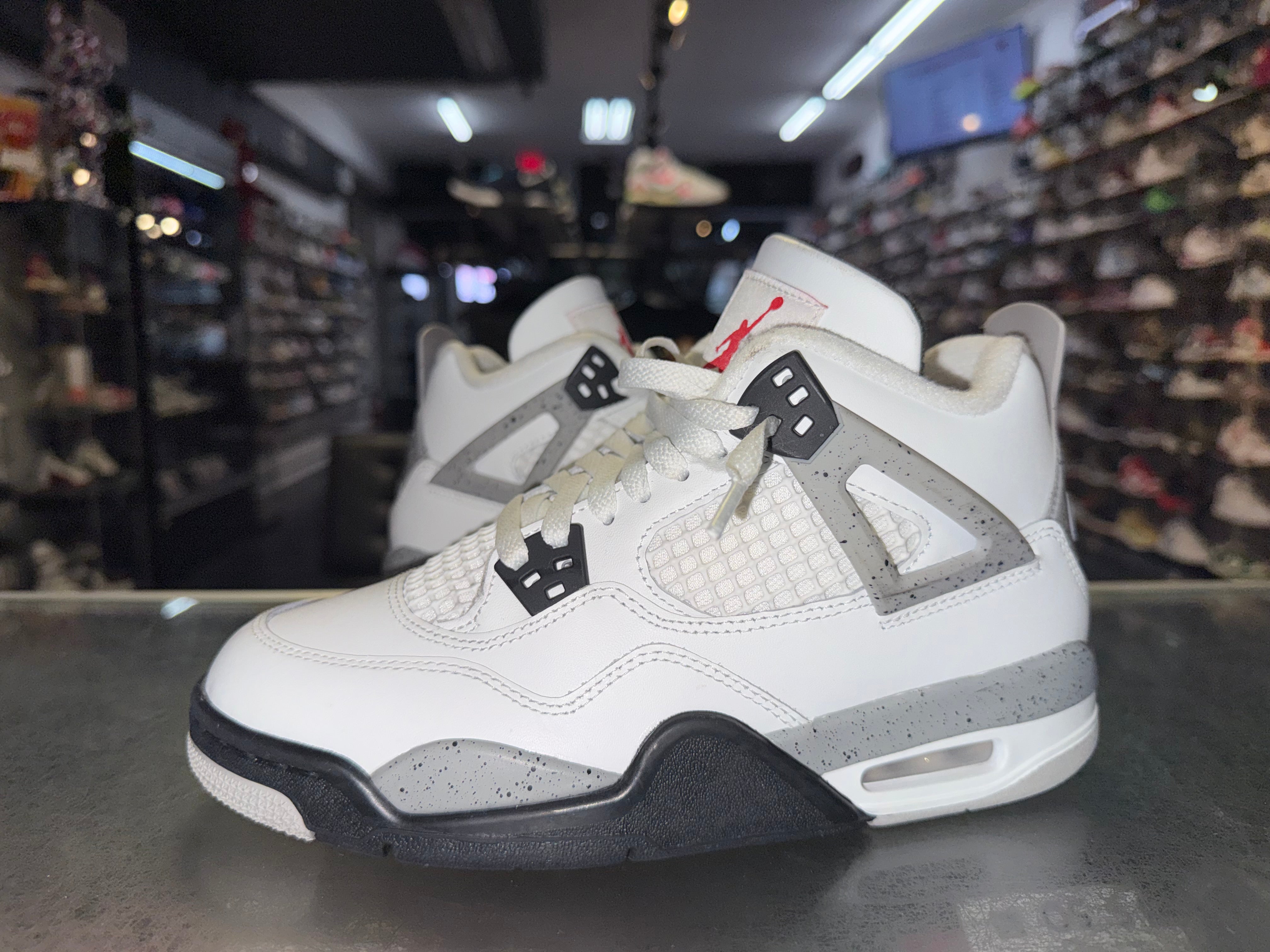 Size 6y Air Jordan 4 “White Cement”