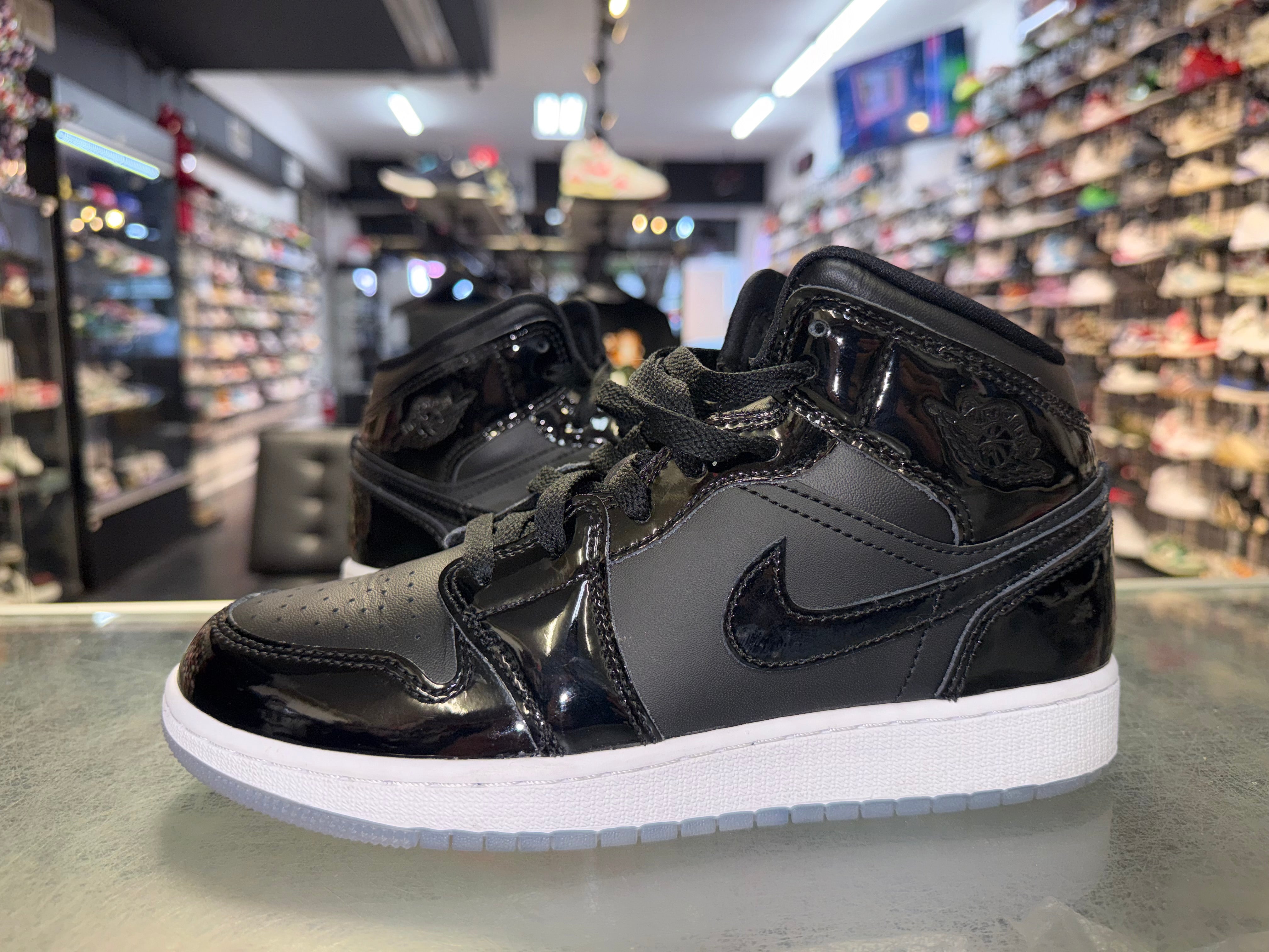 Size 6y Air Jordan 1 Mid “Space Jam”