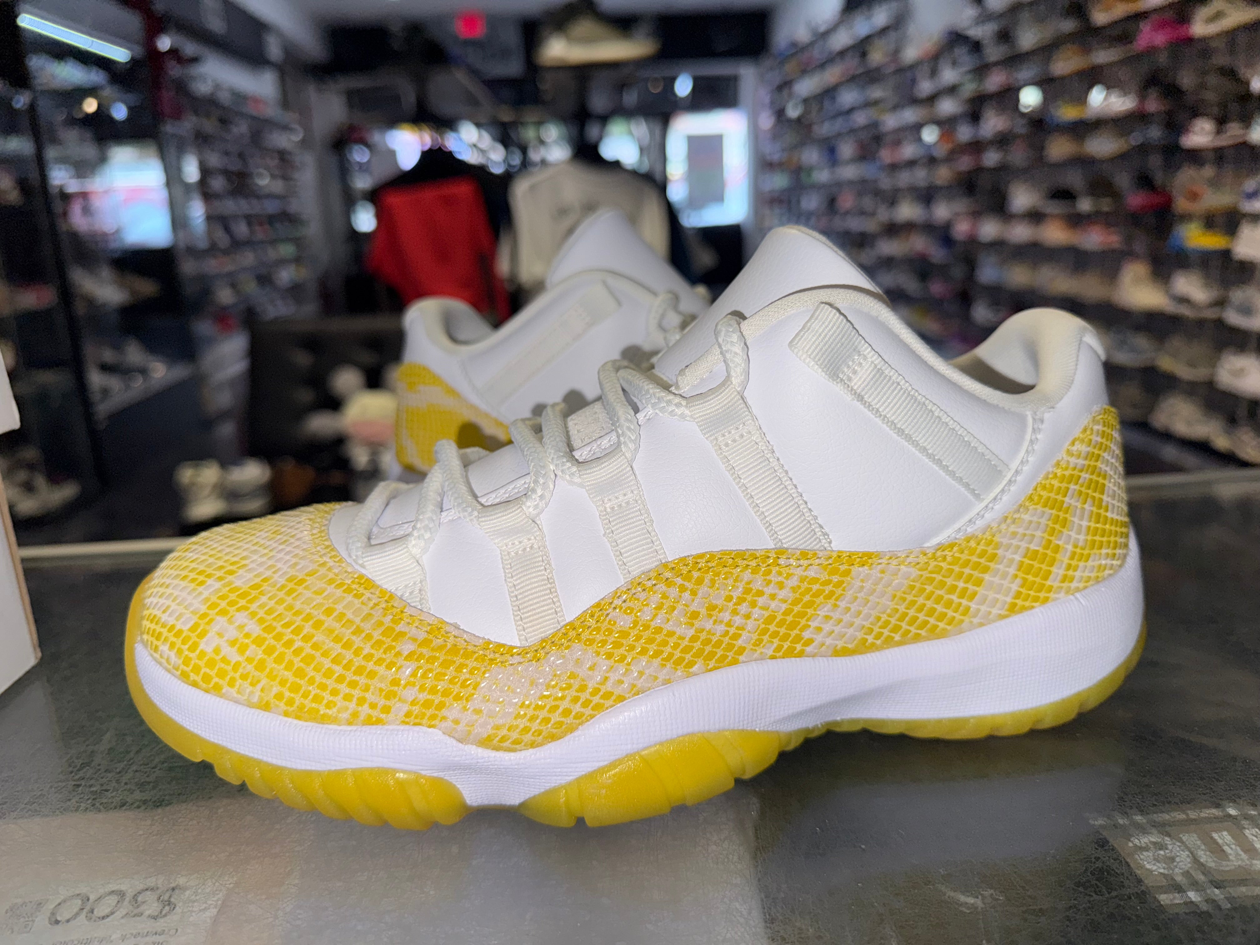 Size 8.5 (10W) Air Jordan 11 Low “Yellow Snakeskin”