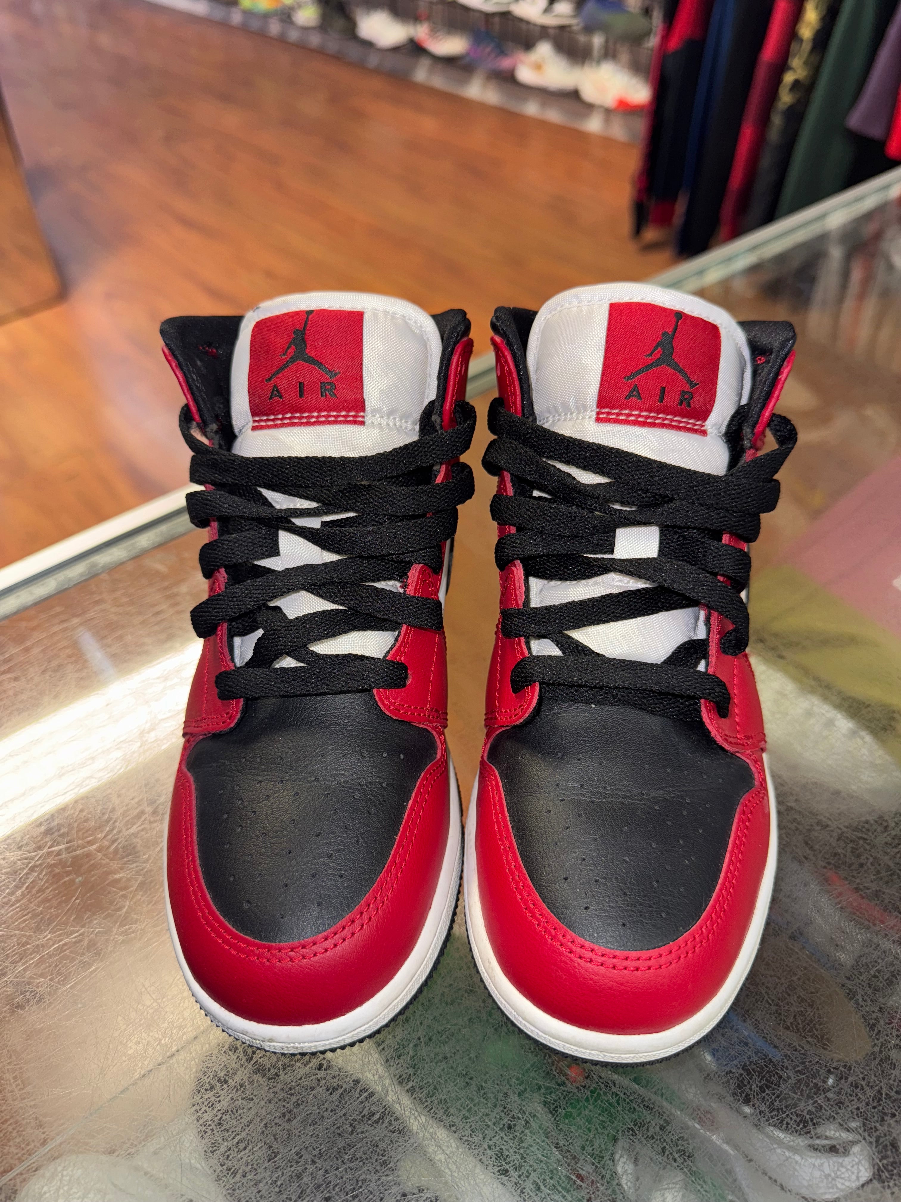 Size 4y Air Jordan 1 Mid "Chicago Black Toe"