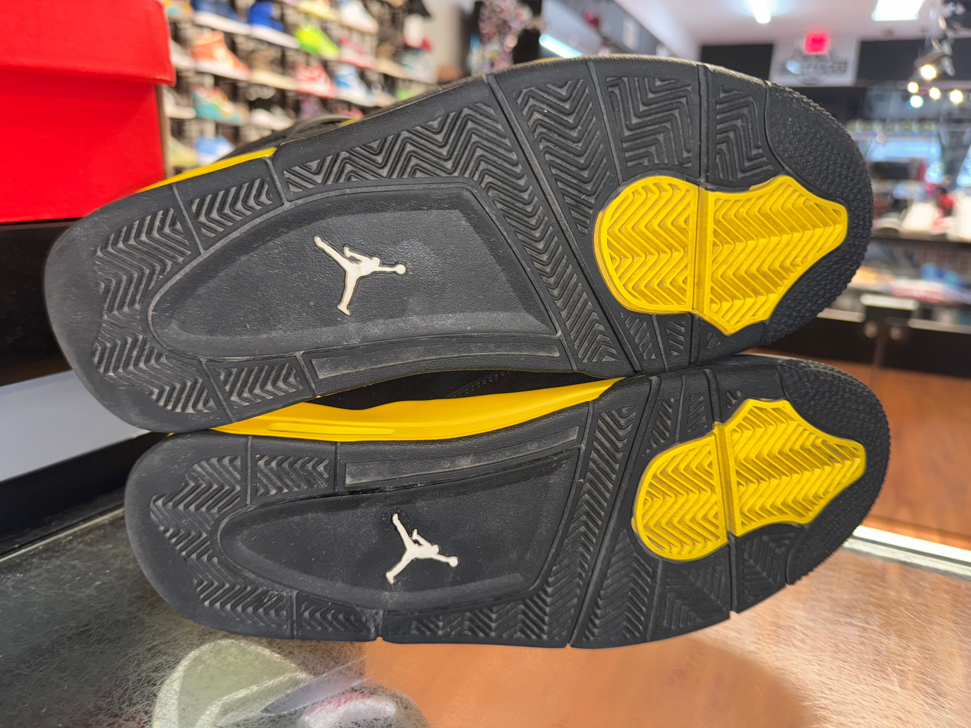 Size 9.5 Air Jordan 4 "Thunder"