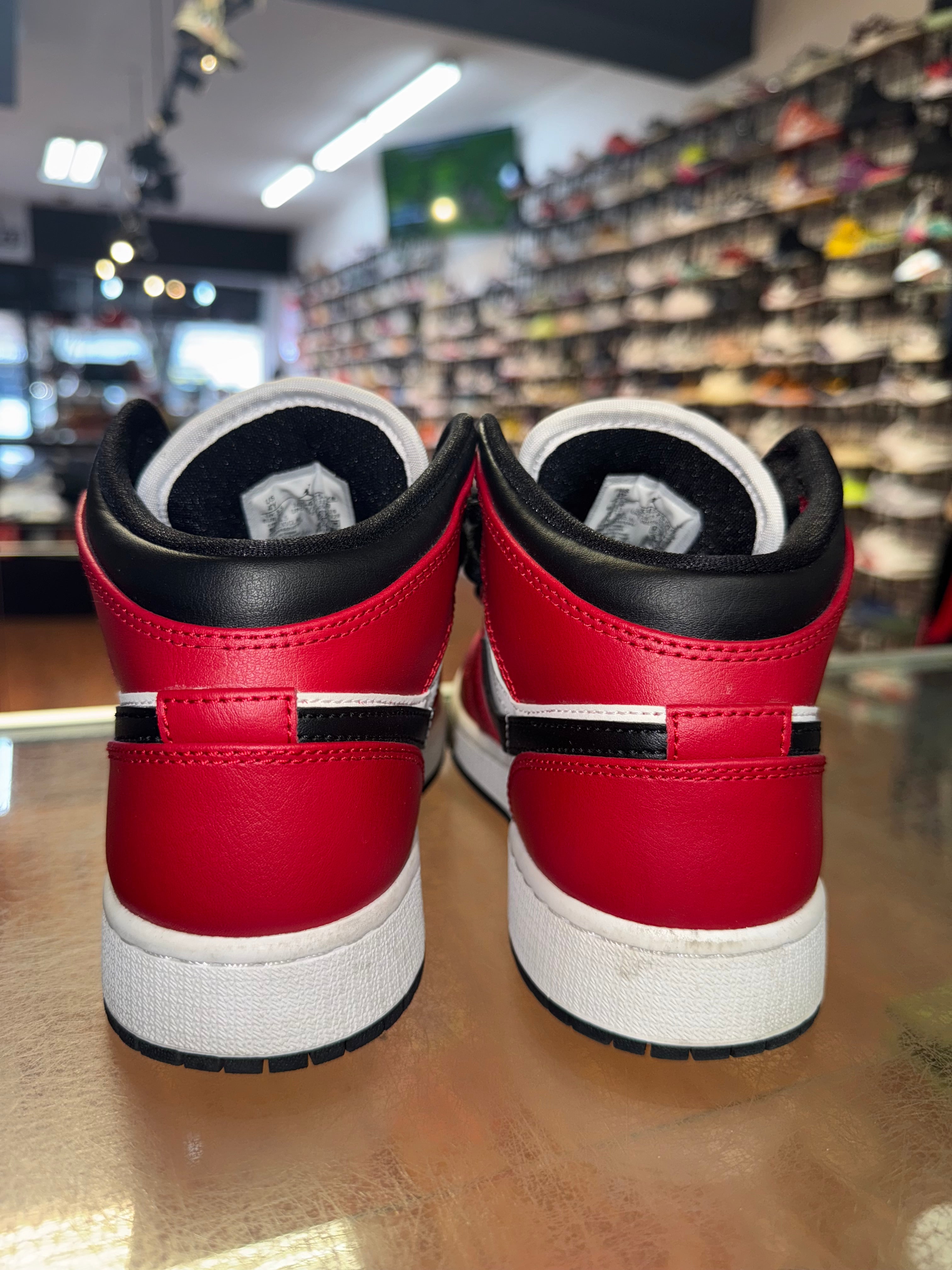 Size 4y Air Jordan 1 Mid "Chicago Black Toe"
