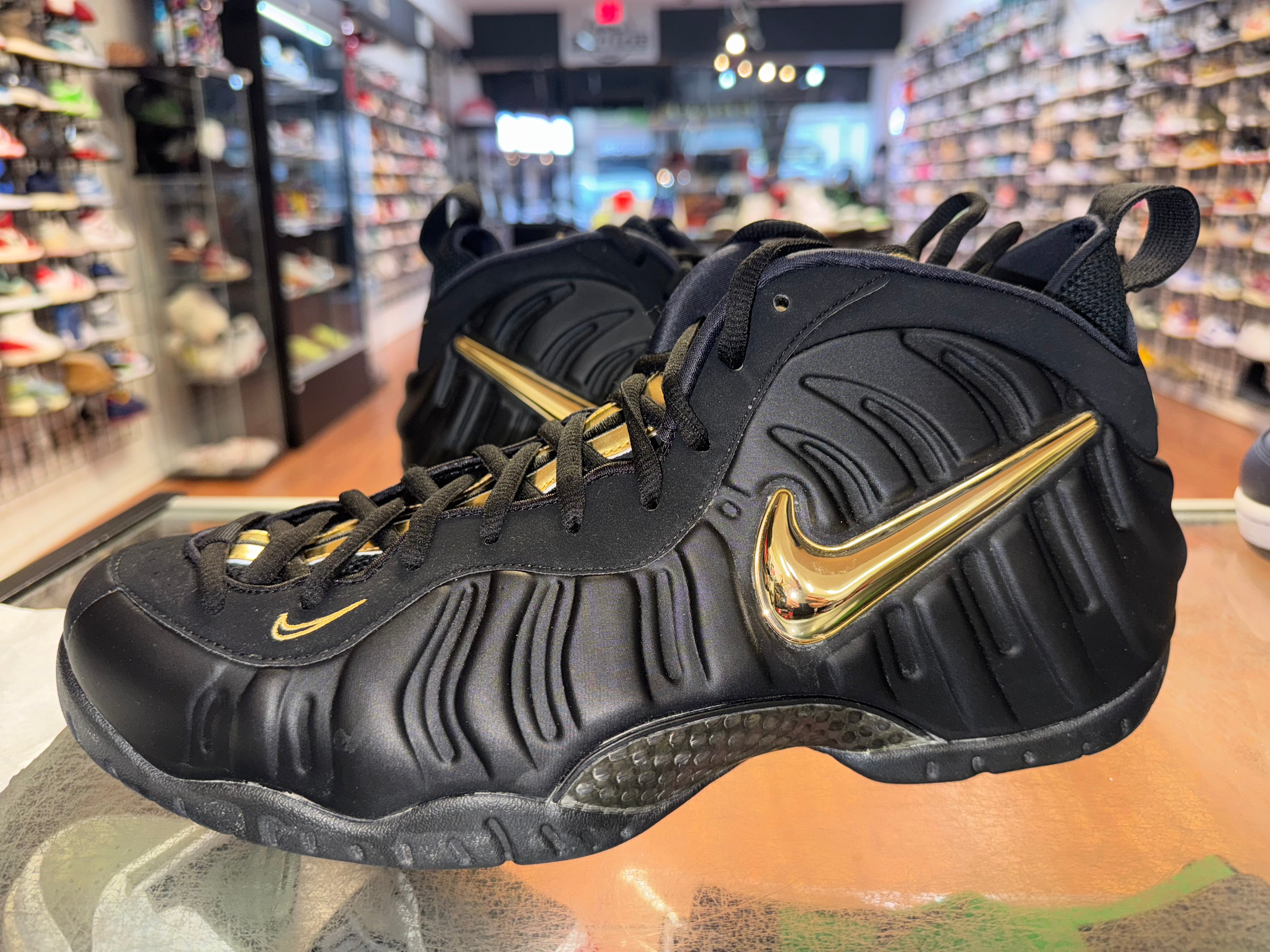 Size 14 Foamposite Pro "Black Metallic Gold"