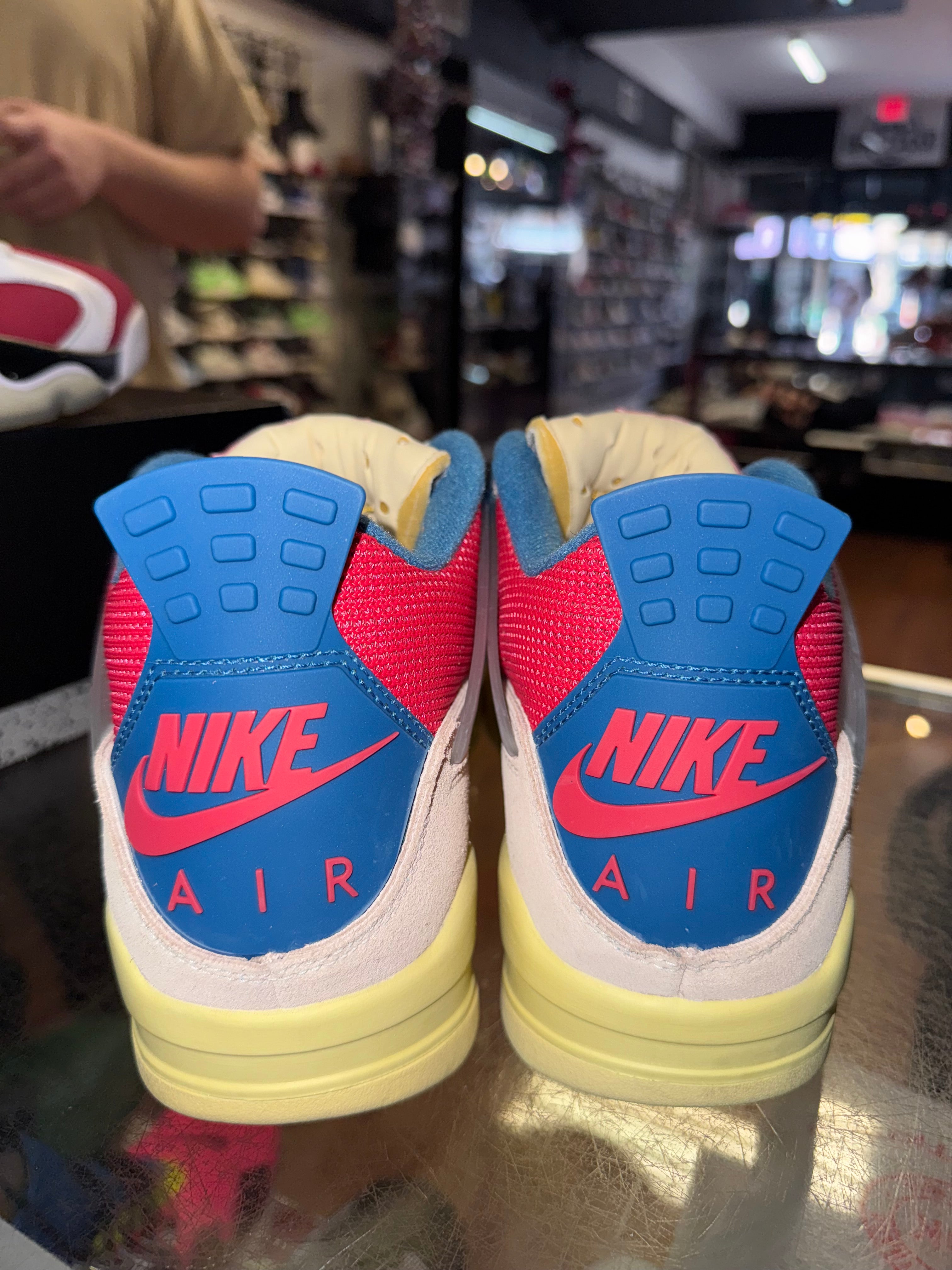 Size 9.5 Air Jordan 4 Union "Guava Ice"