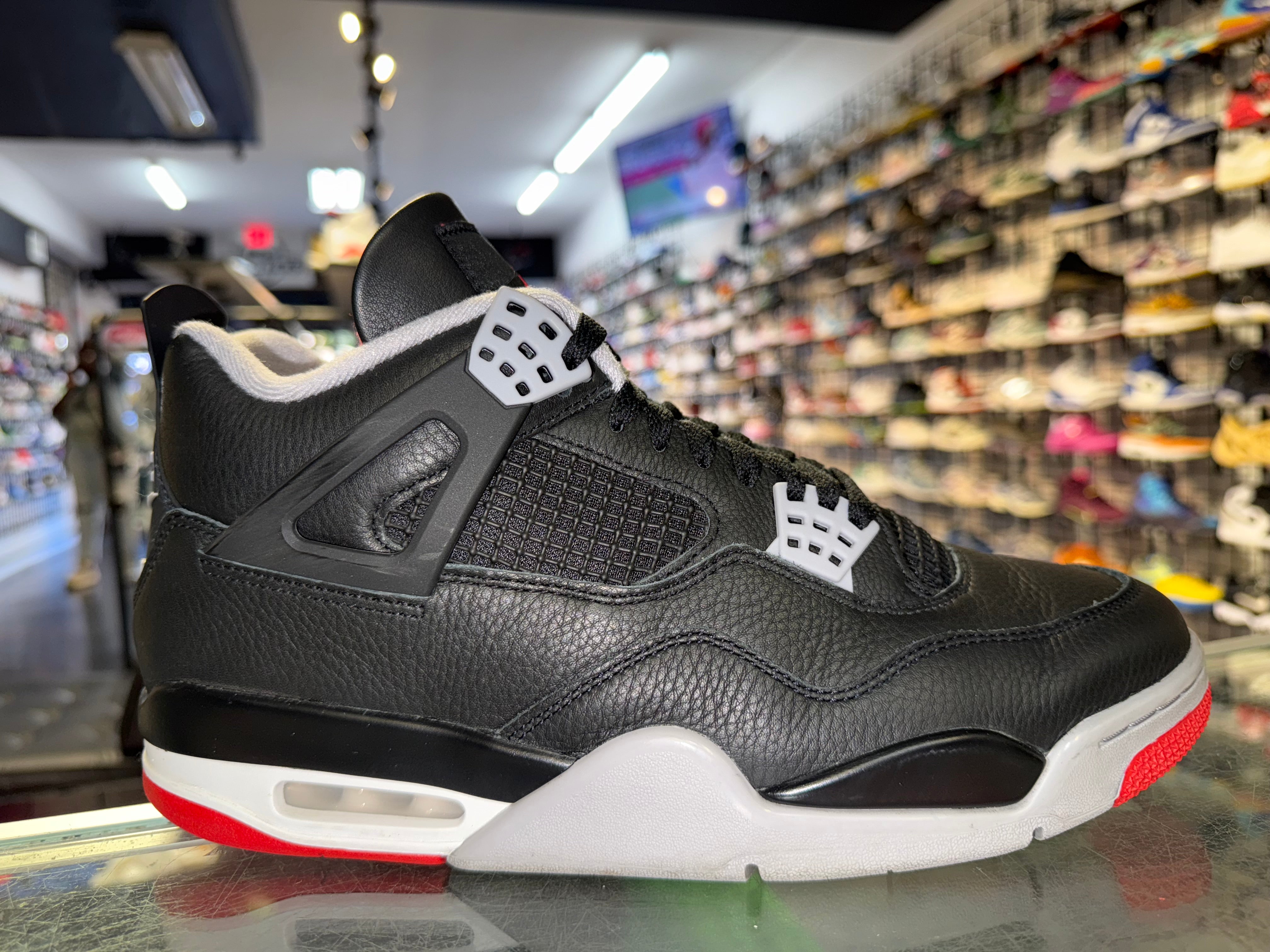 Size 10.5 Air Jordan 4 "Bred Reimagined"