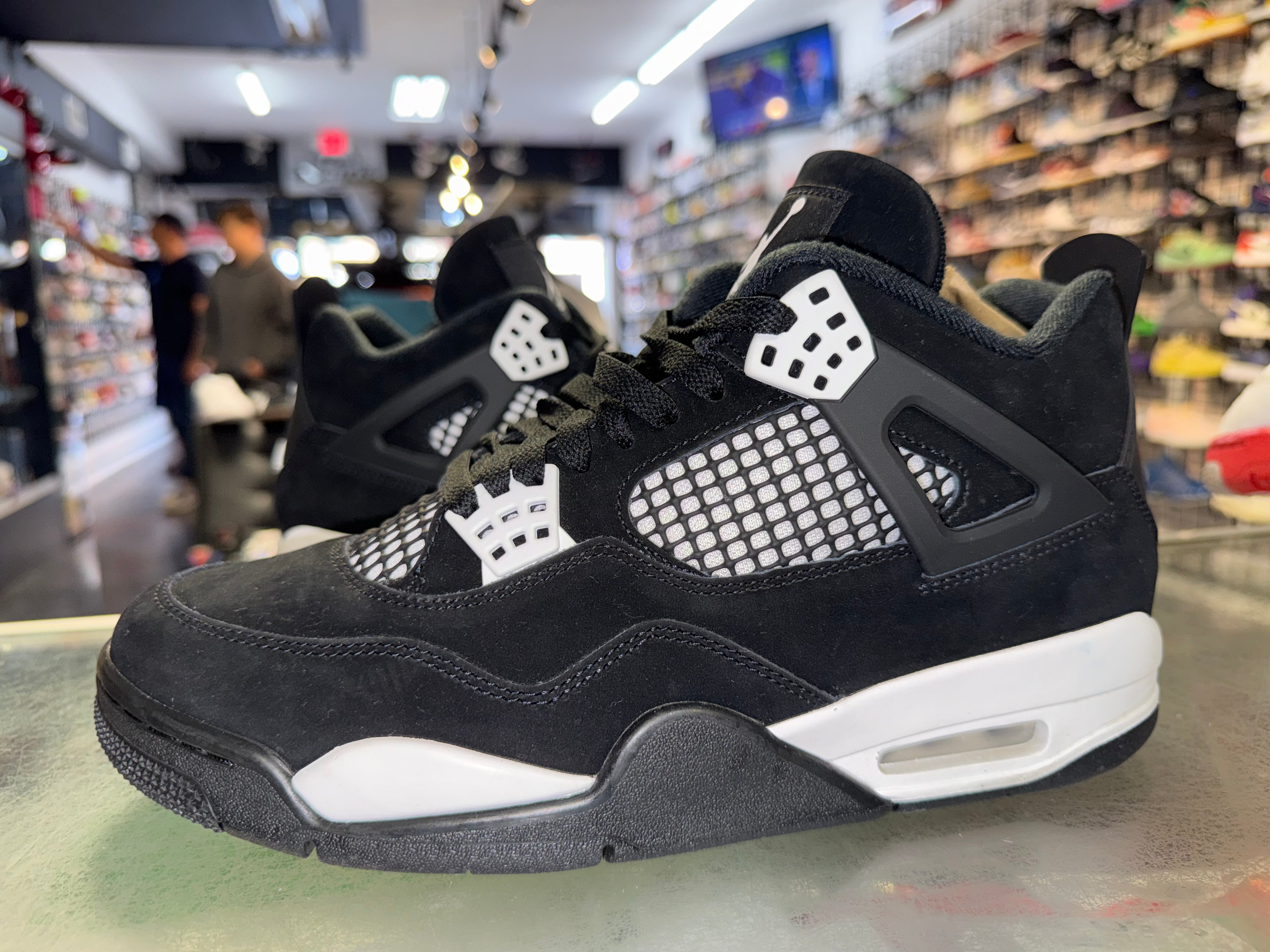 Size 9.5 Air Jordan 4 "White Thunder"