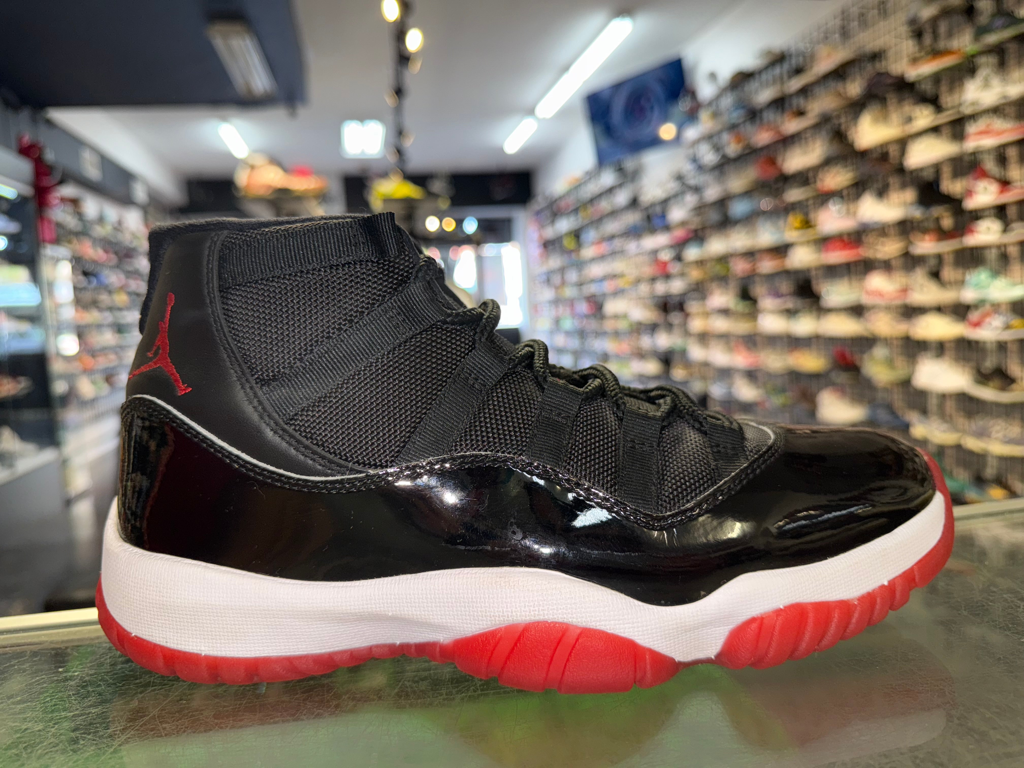 Size 8.5 Air Jordan 11 "Bred"